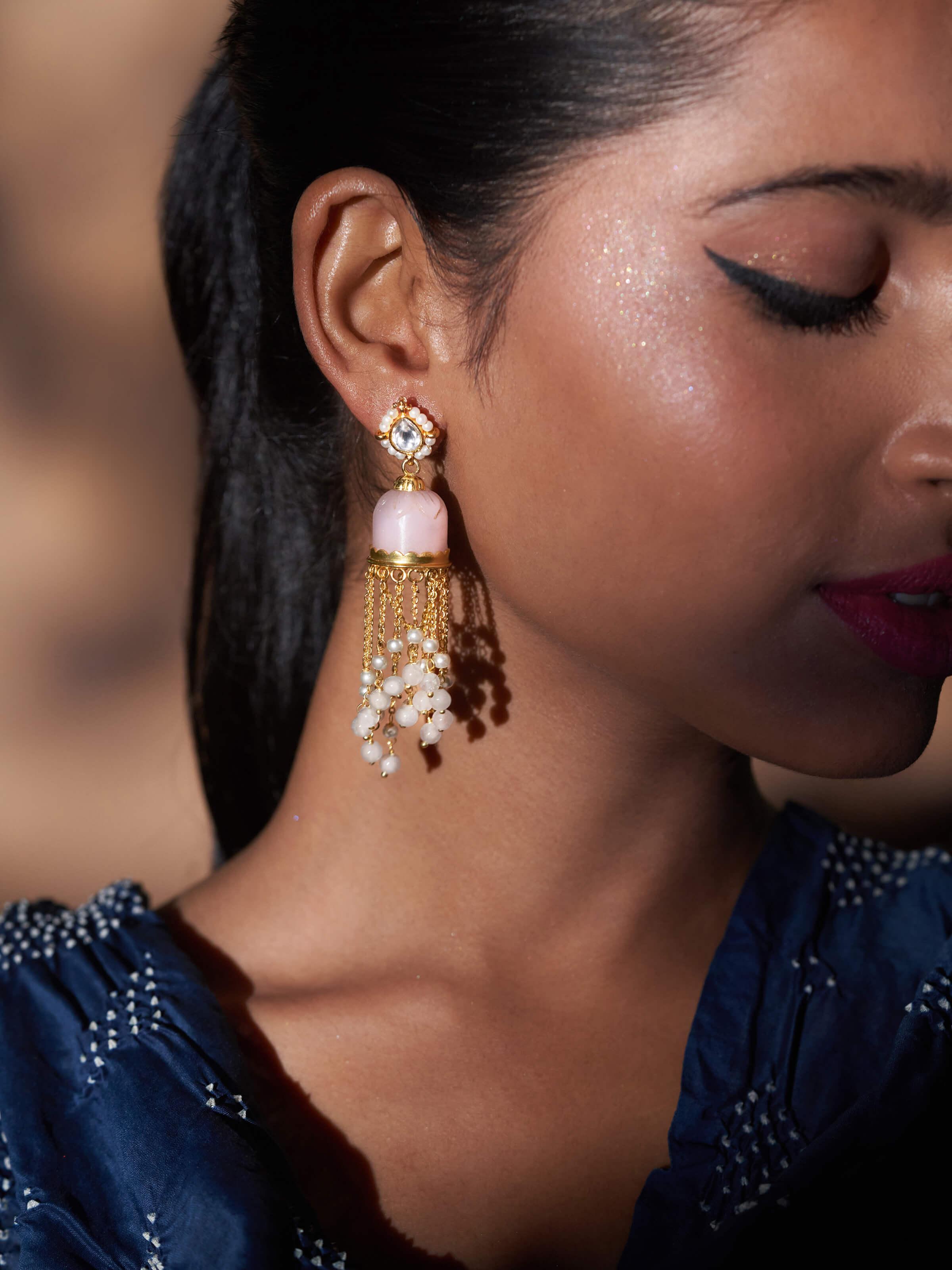 Angled view of Silver Smithing Jhumkas showing the detailed design and shine.