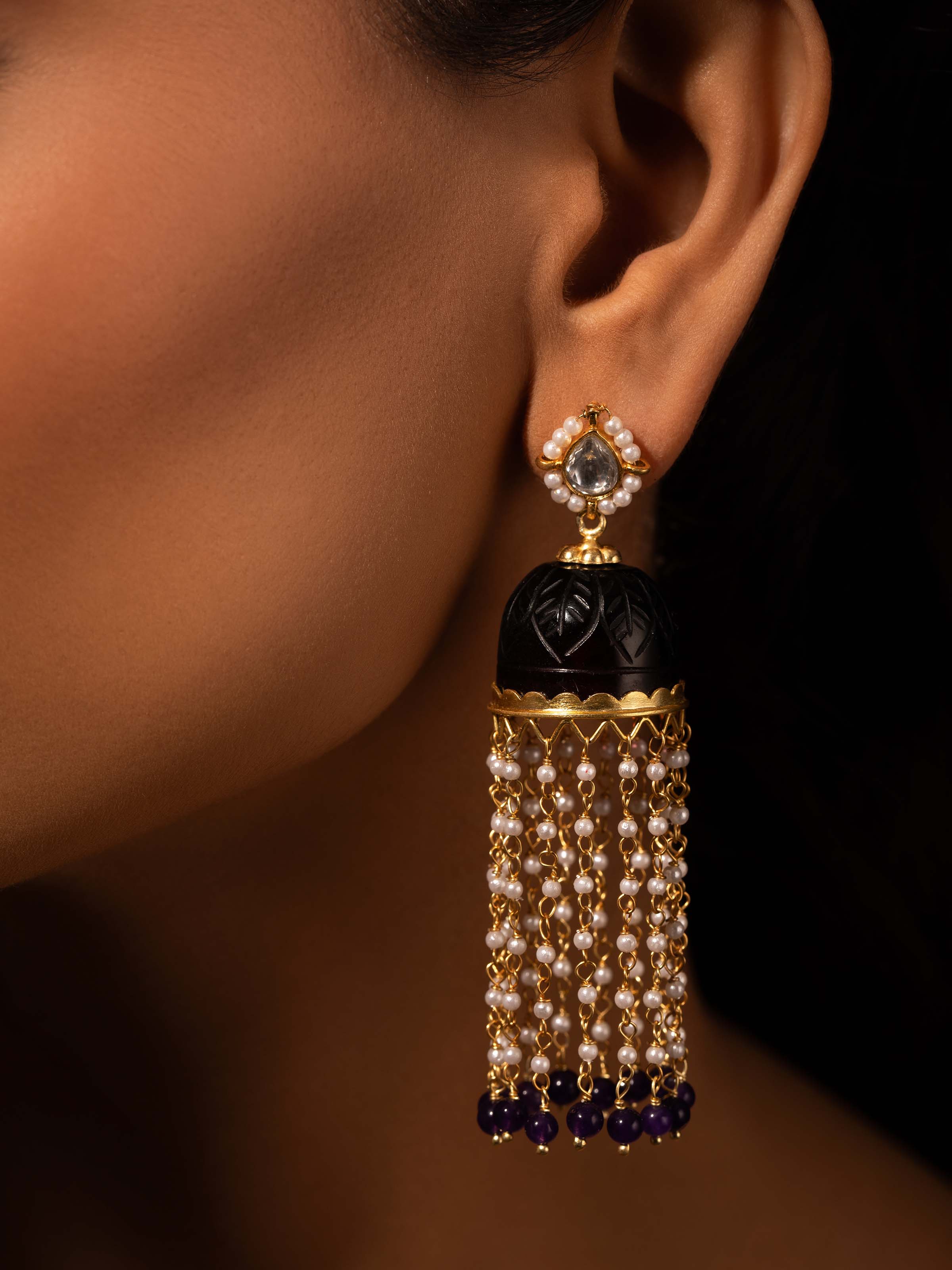 Side view of Silver Smithing Jhumkas highlighting the delicate craftsmanship and shine.