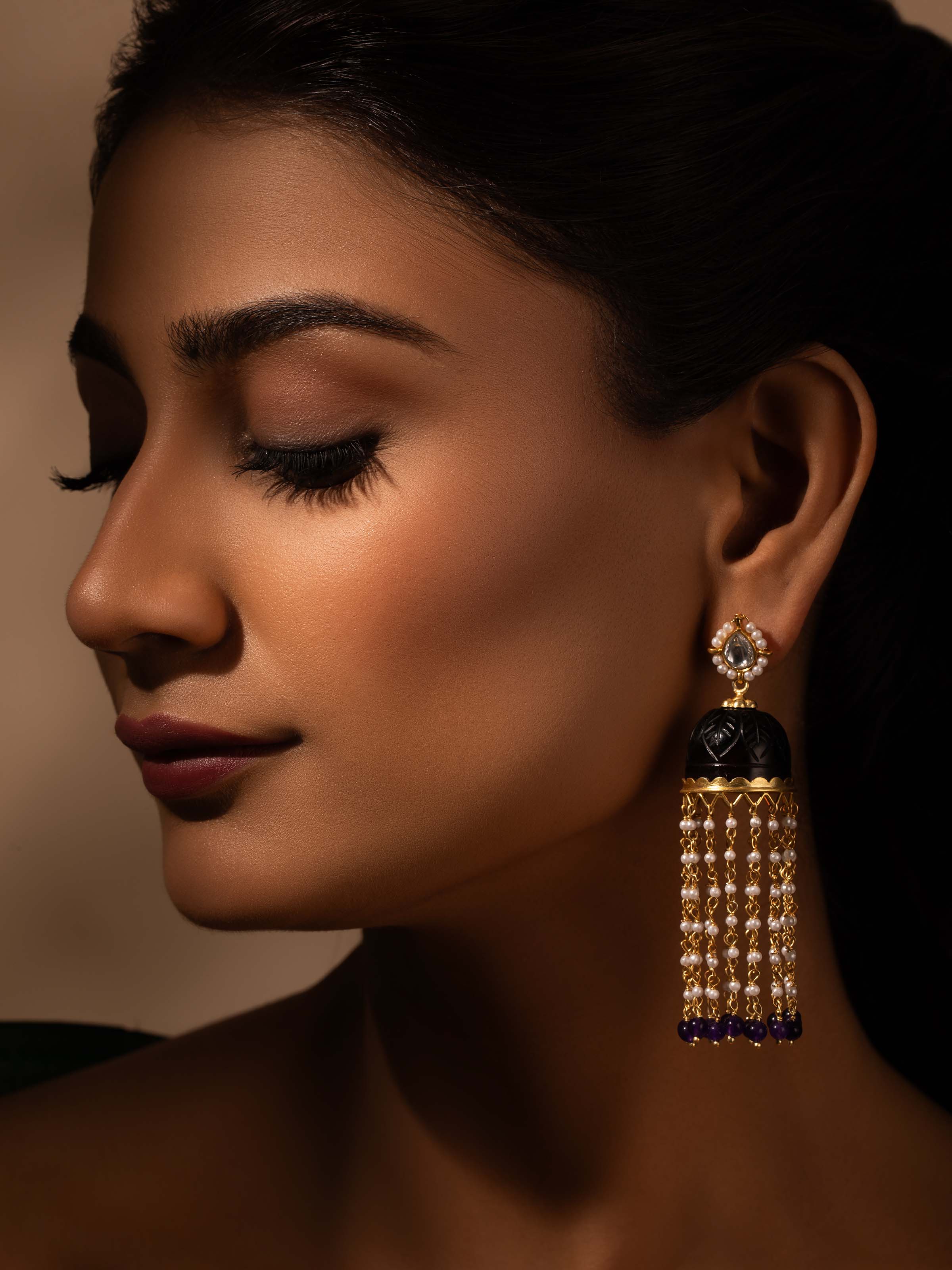 Close-up of Silver Smithing Jhumkas focusing on the intricate work and fine details.