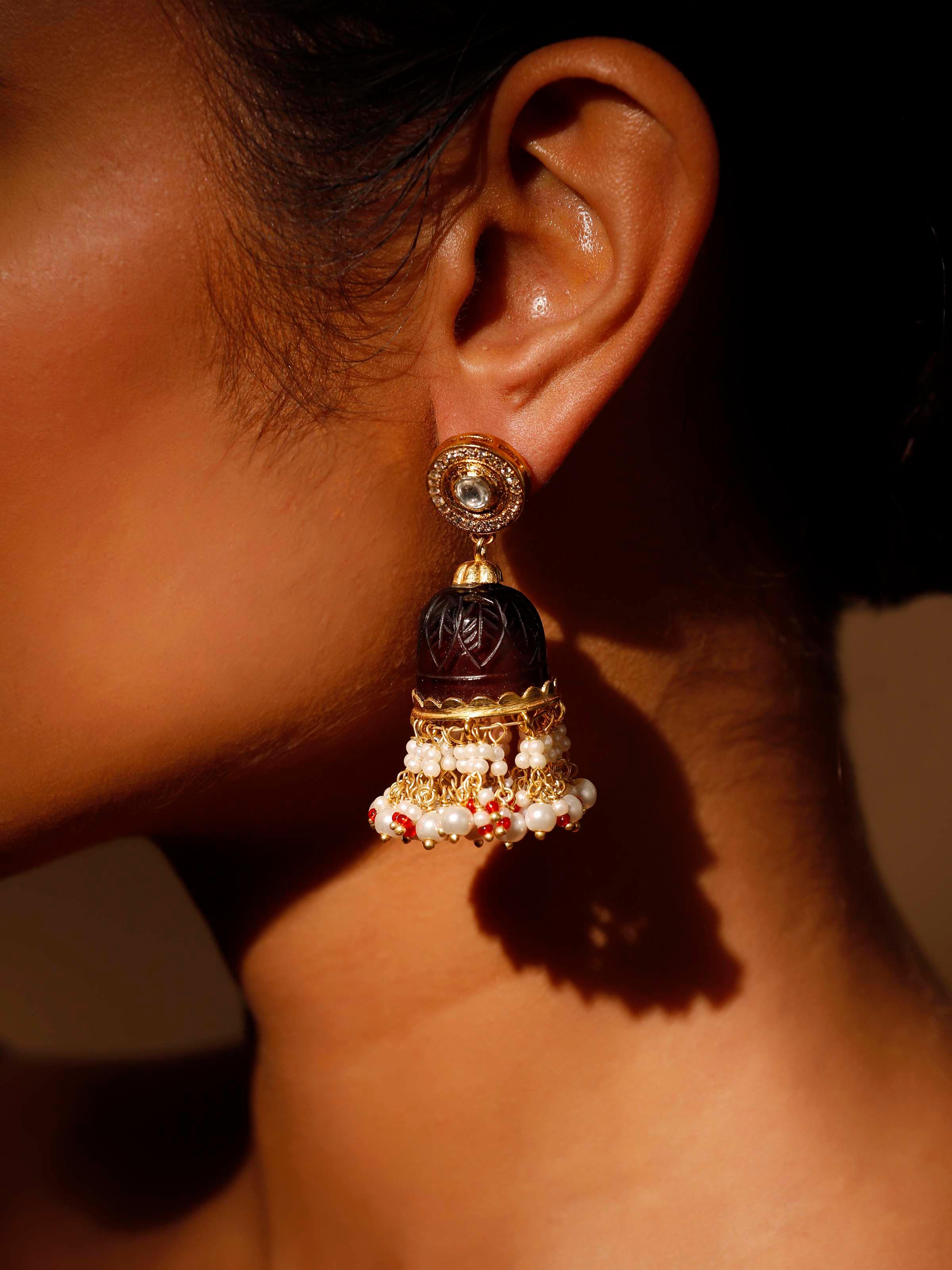 Side view of Silver Smithing Jhumkas showcasing detailed silver craftsmanship.