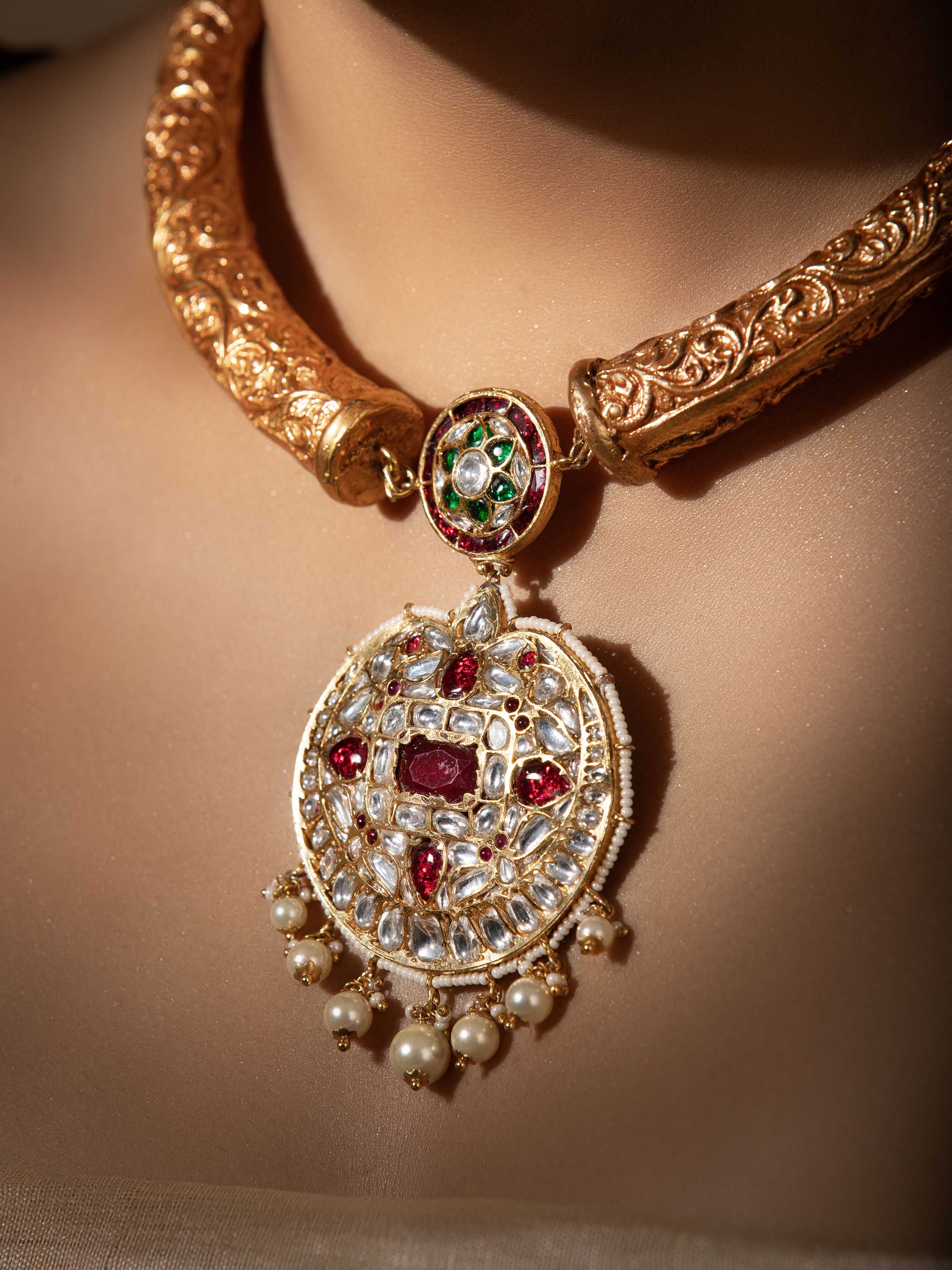 "Side view of Bandhel metal collar necklace highlighting design details"