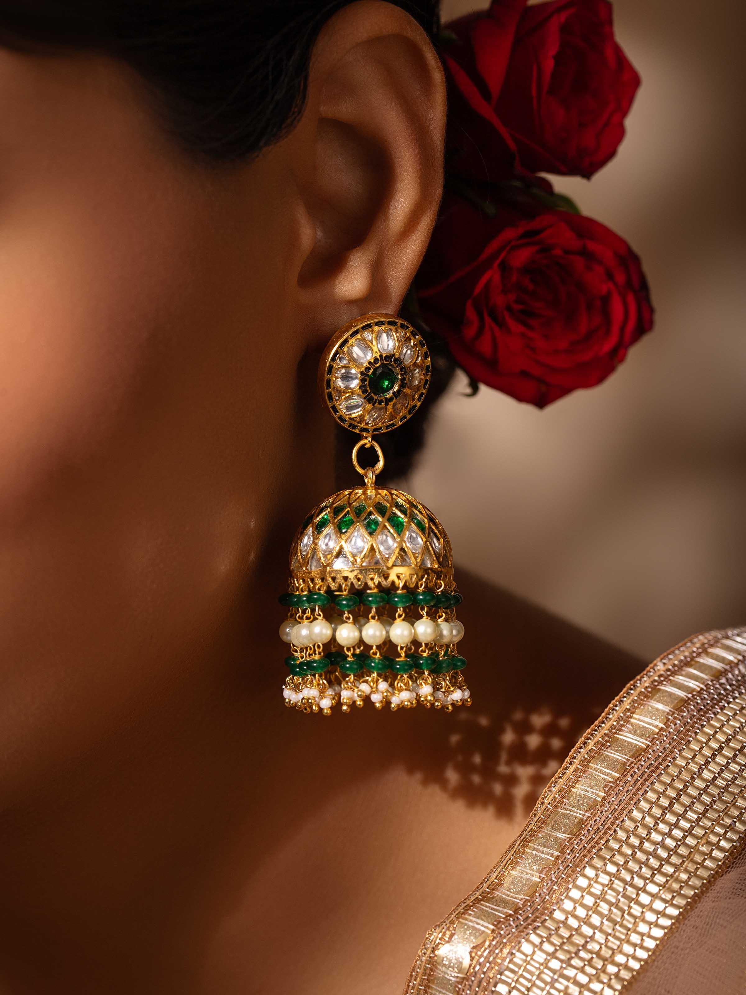 Alternate lifestyle view of Bandhel Metal Jhumkas worn with braided hairstyle.