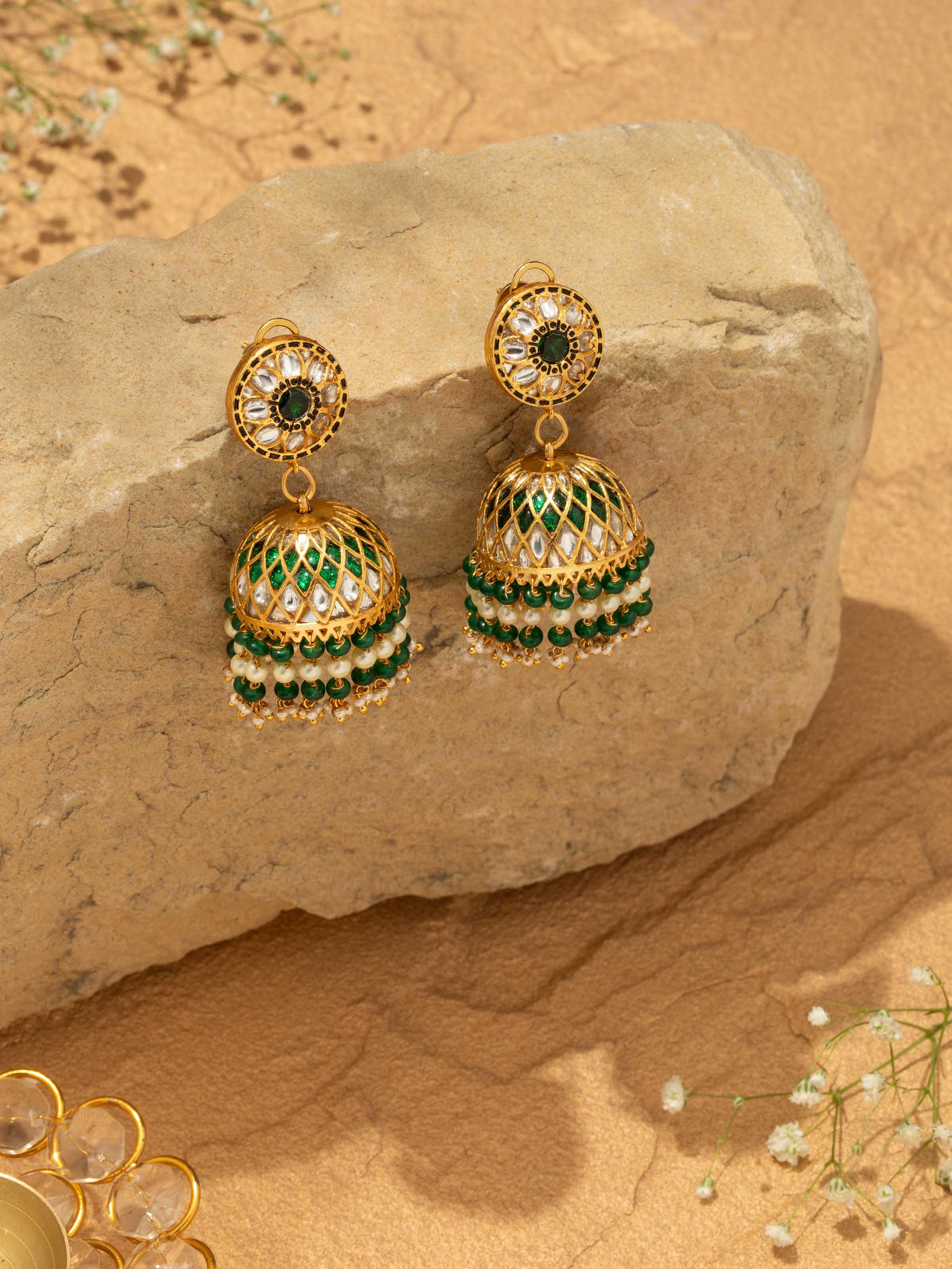 Overhead view capturing the dome shape and hanging elements of Bandhel Metal Jhumkas.