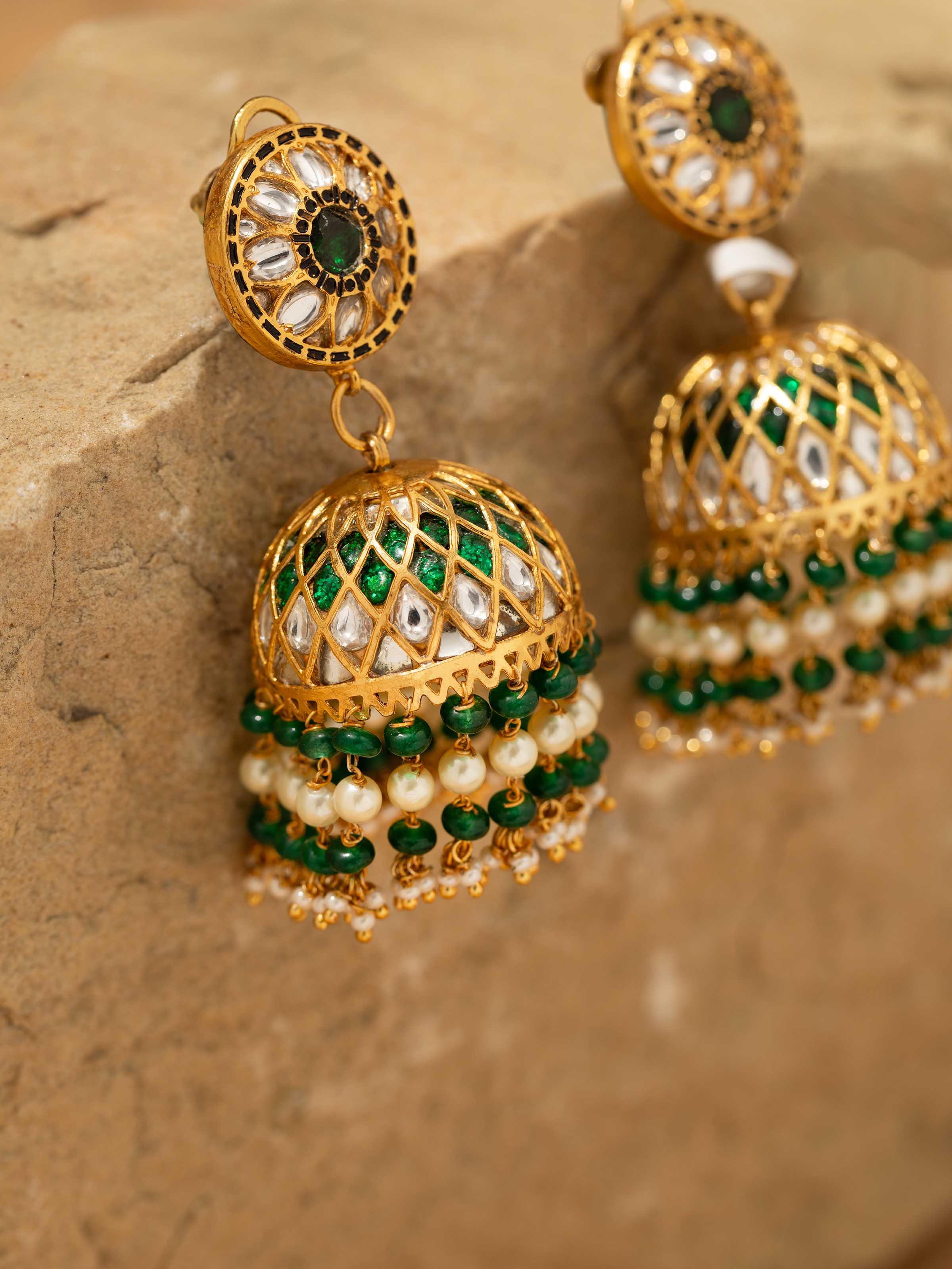 Detail shot highlighting the intricate embossing and oxidised texture of Bandhel Metal Jhumkas.