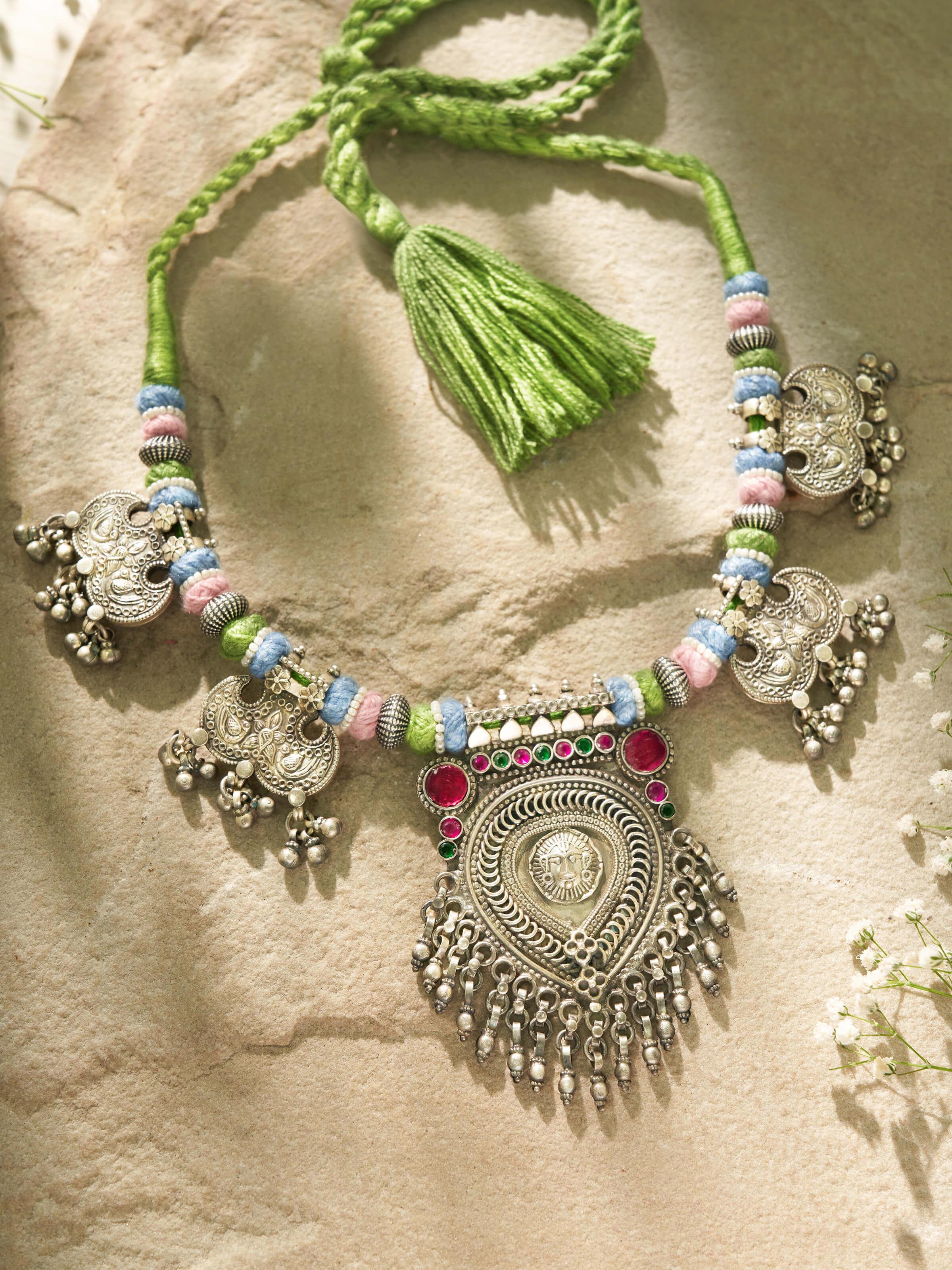 Side view of Silver Smithing Collar Necklace showcasing the refined silver craftsmanship.