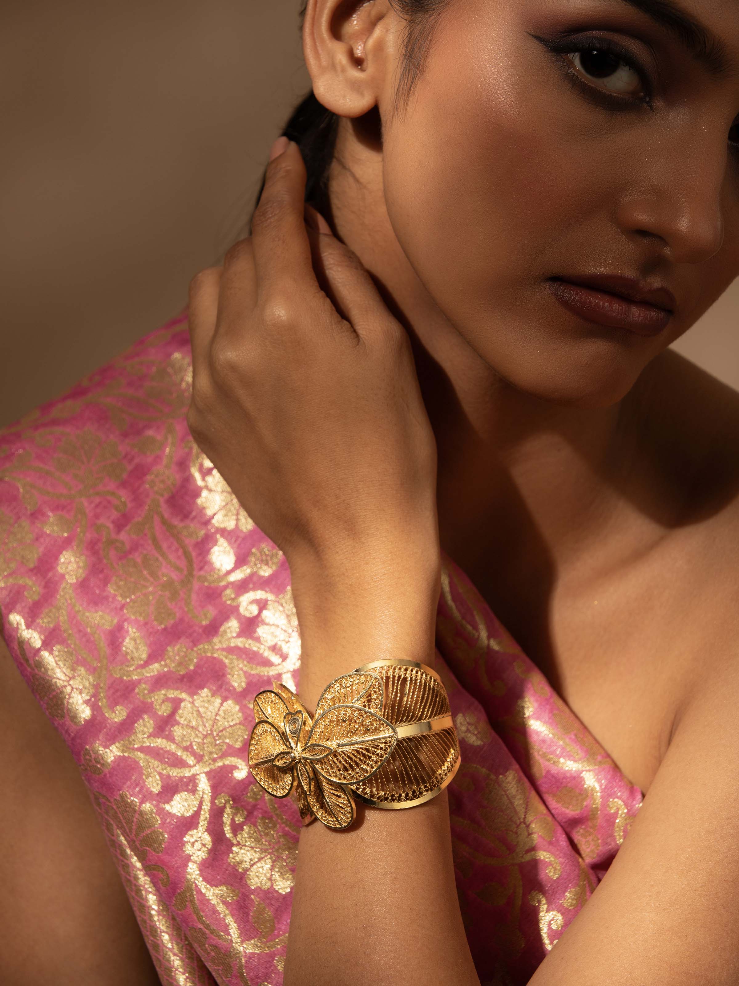 Side view of Silver Filigree Hand Cuff displaying the detailed filigree patterns and design.