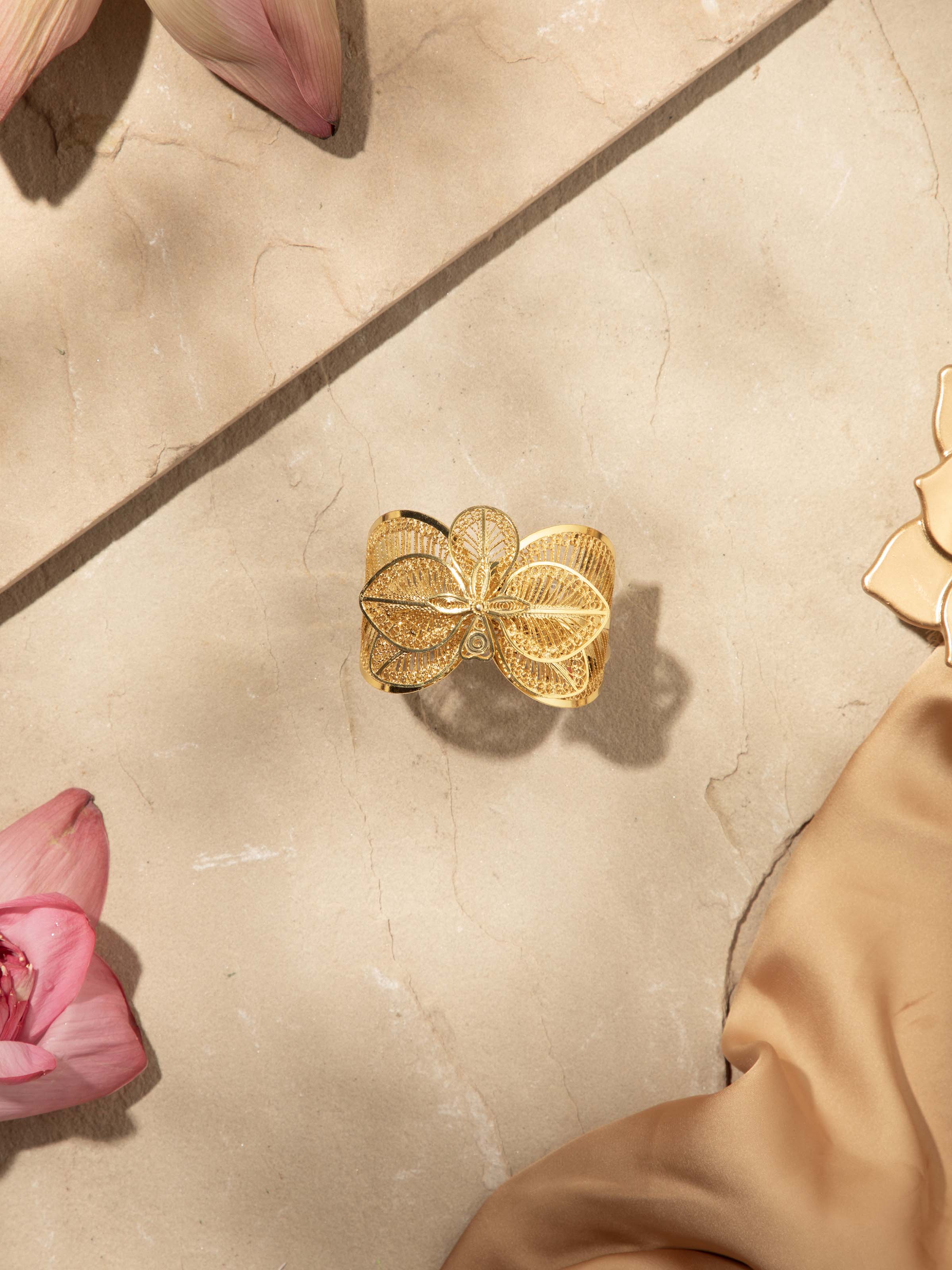 Overhead view of Silver Filigree Hand Cuff emphasizing its intricate filigree design and elegance.