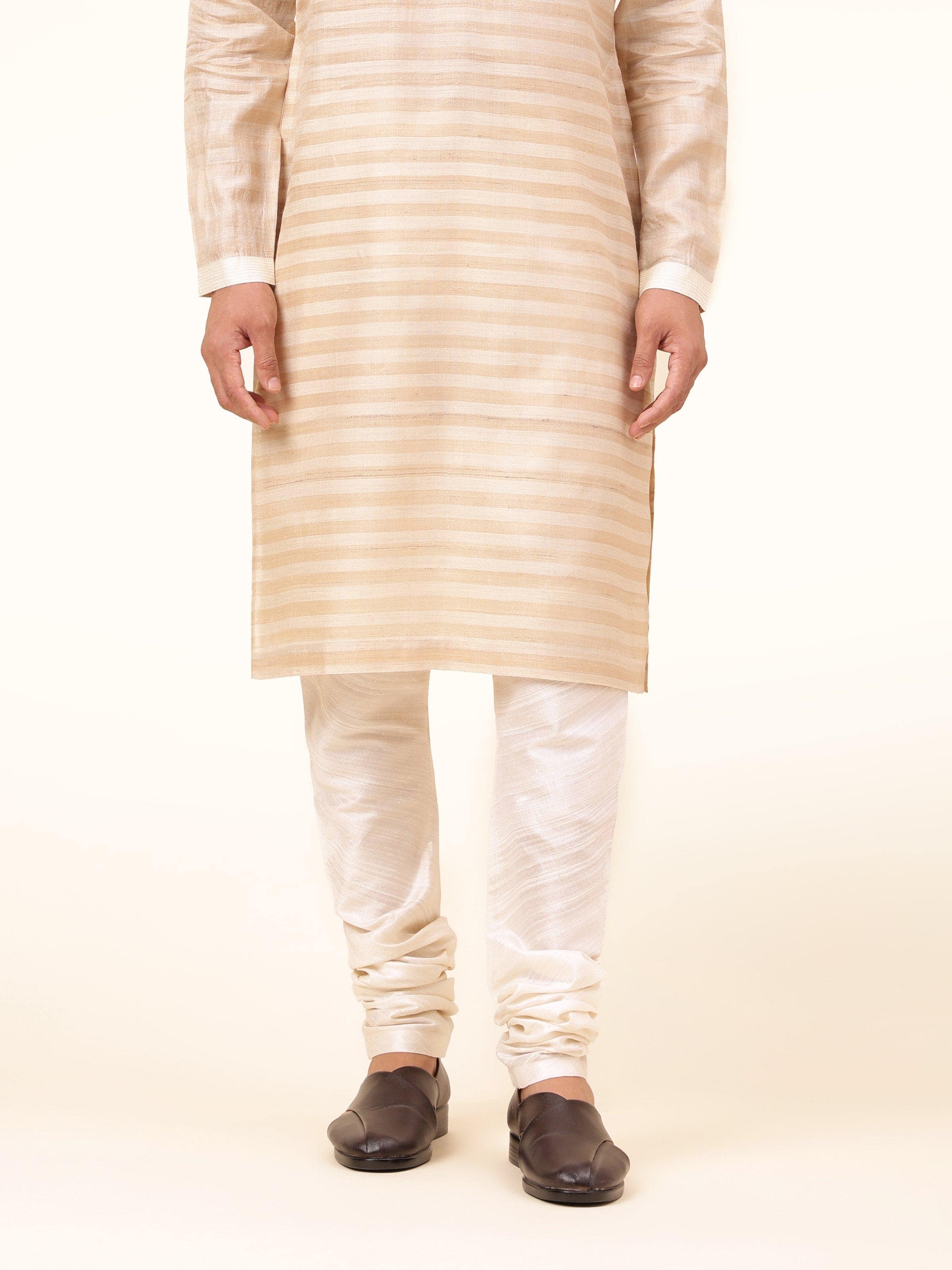 Front view of white Bhagalpur silk churidar with elasticated waist and clean tailored finish.