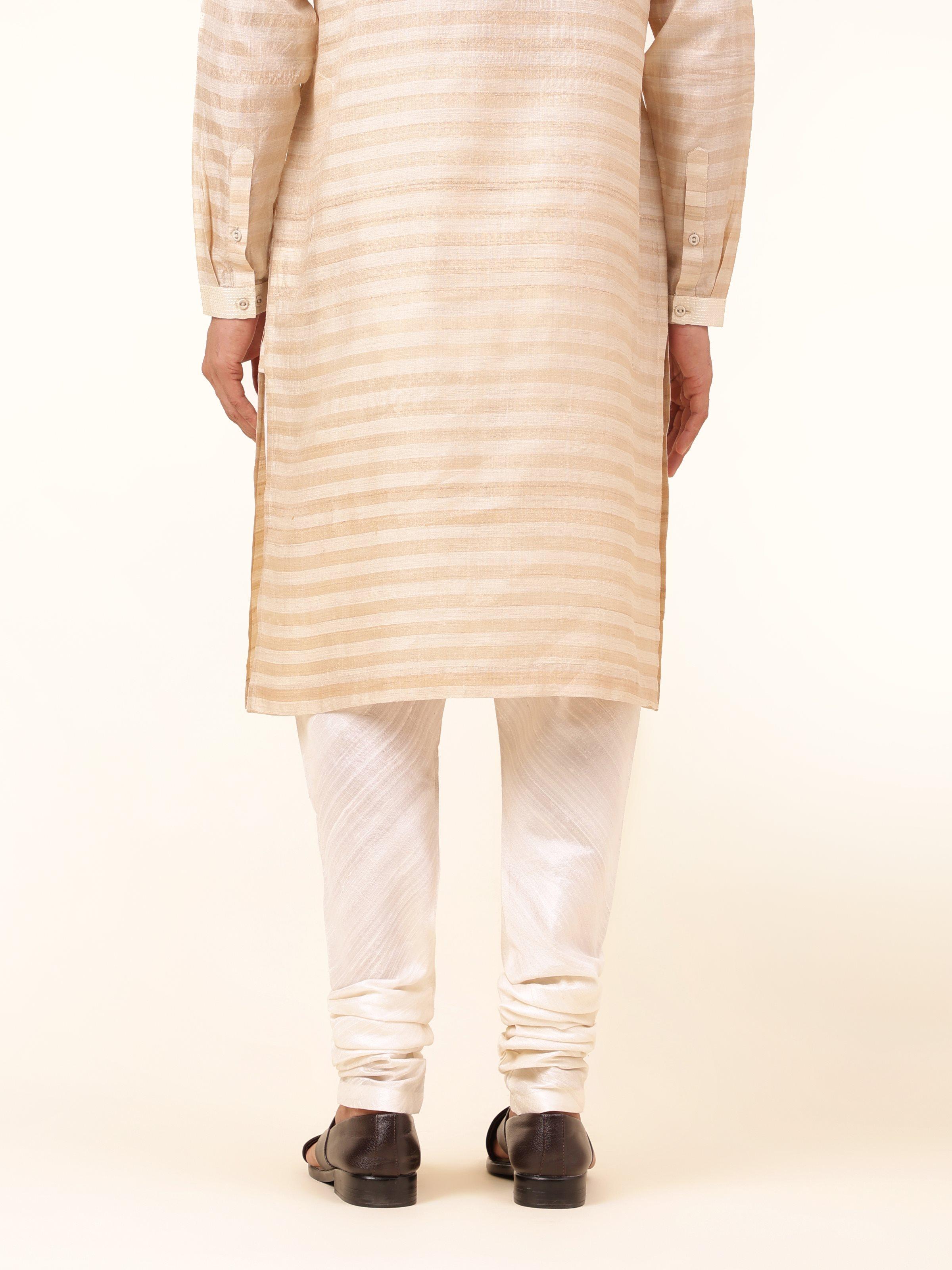Back view of white Bhagalpur silk churidar showing minimal design and stretchable waist.