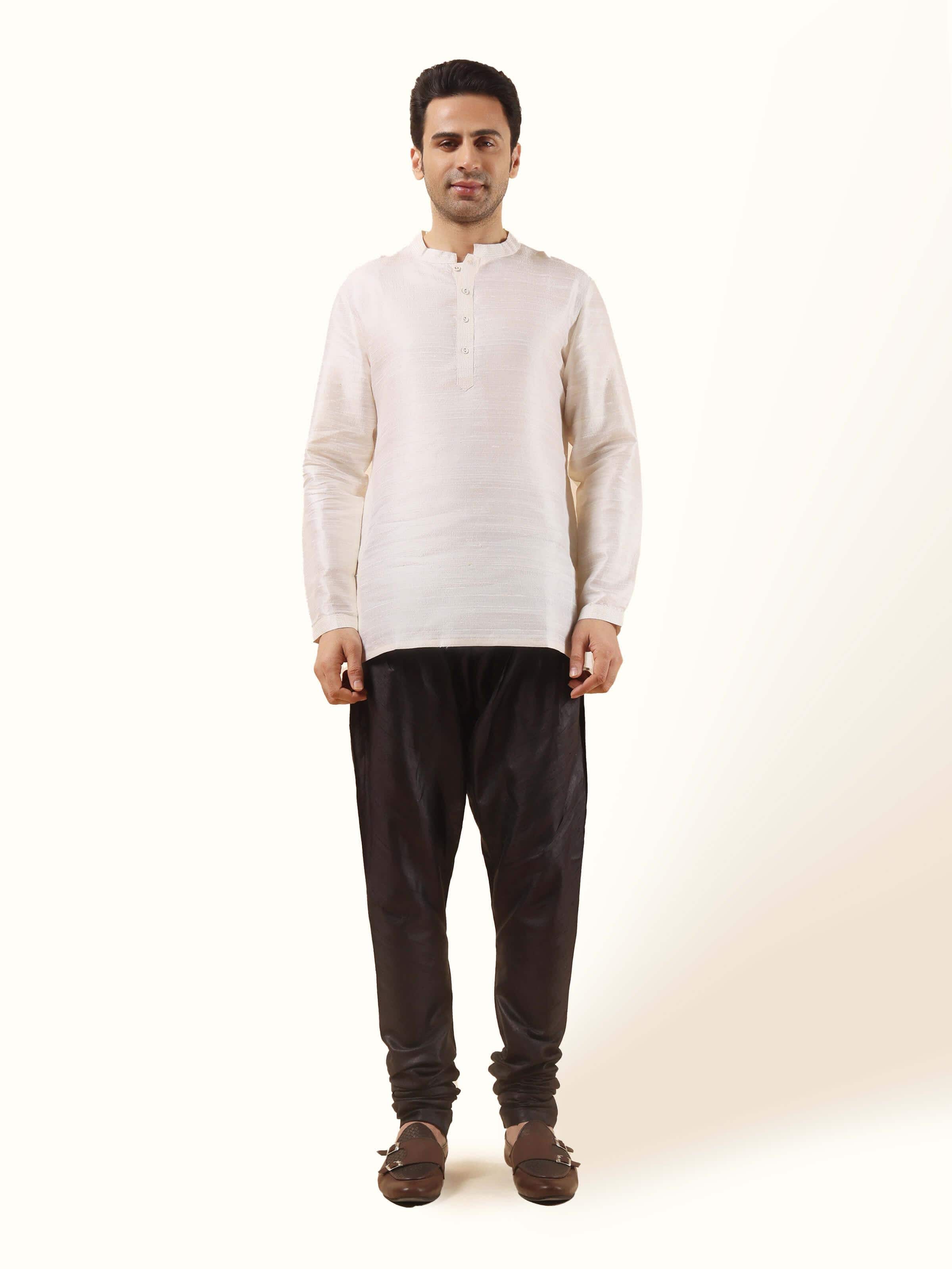 Front view of the black silk Bhagalpur elasticated churidar, offering comfort and understated sophistication.