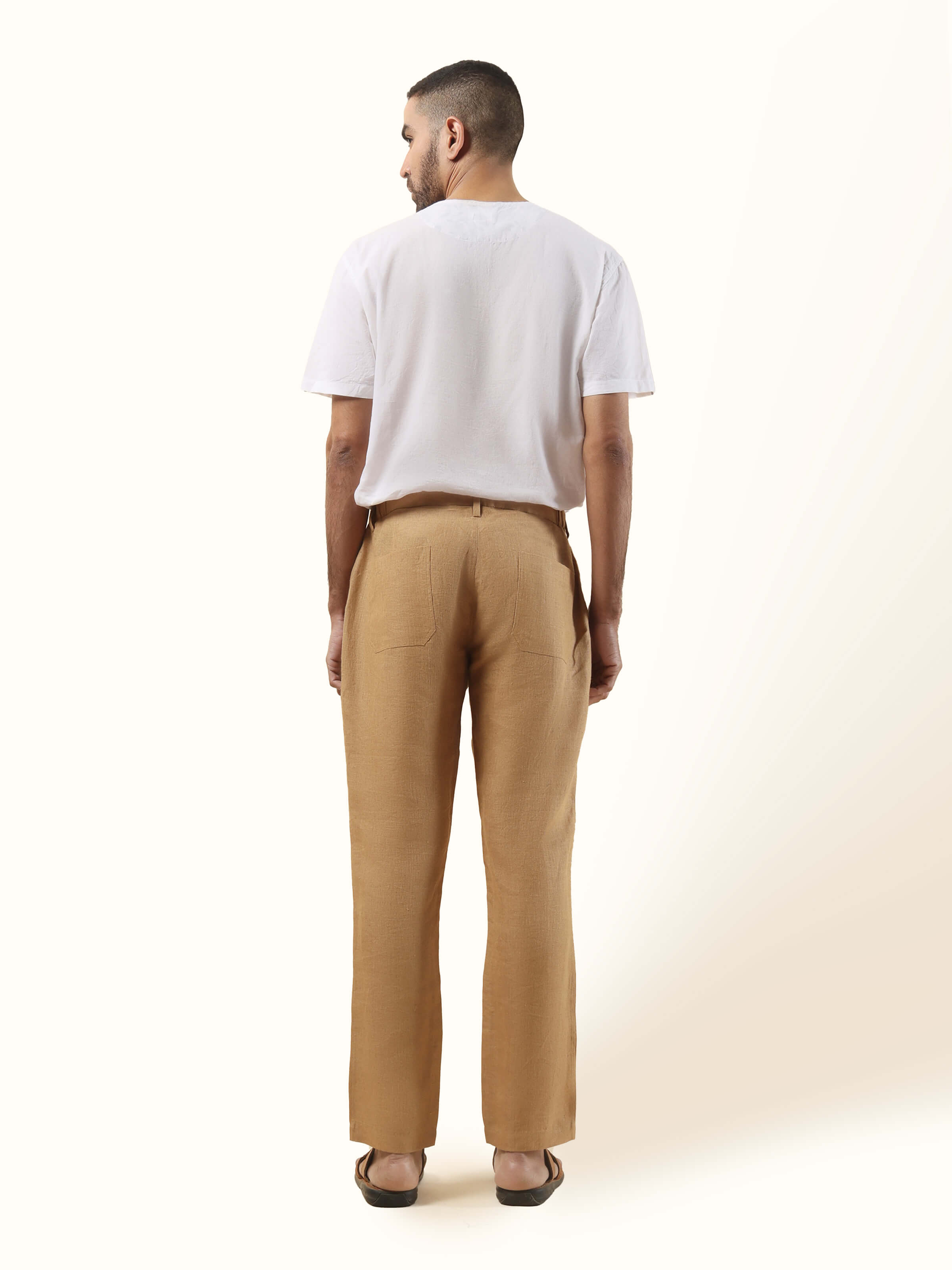 Back view of beige linen lounge pant with clean finish and laid-back design