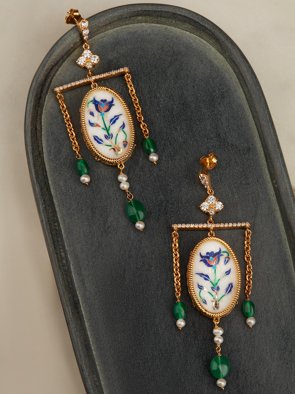 Back view of Pacchikari Silver Drop Earrings highlighting the secure clasp and intricate silver design.