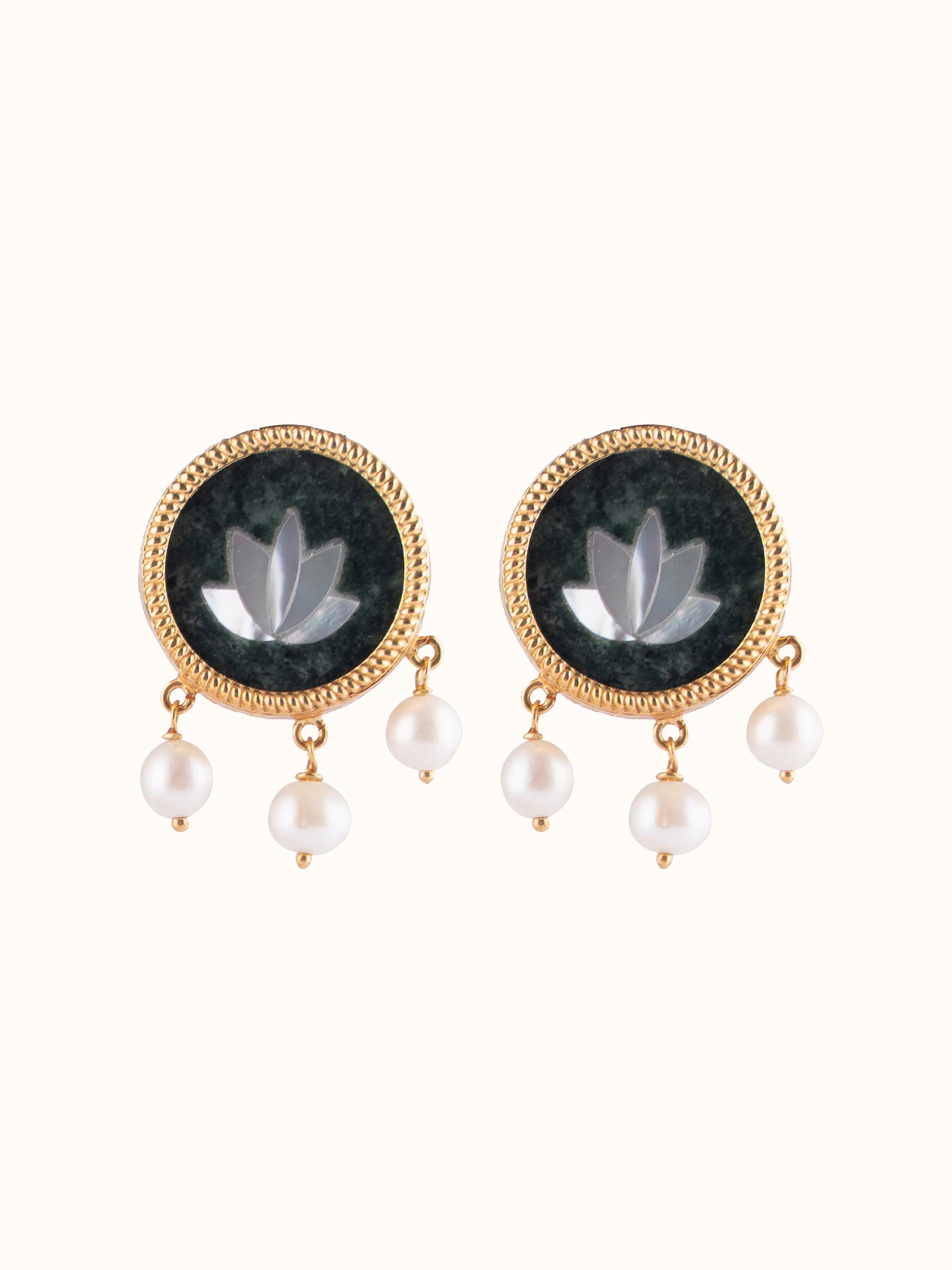 Front view of Parchinkari silver drop earrings featuring inlaid motifs and a handcrafted teardrop shape.