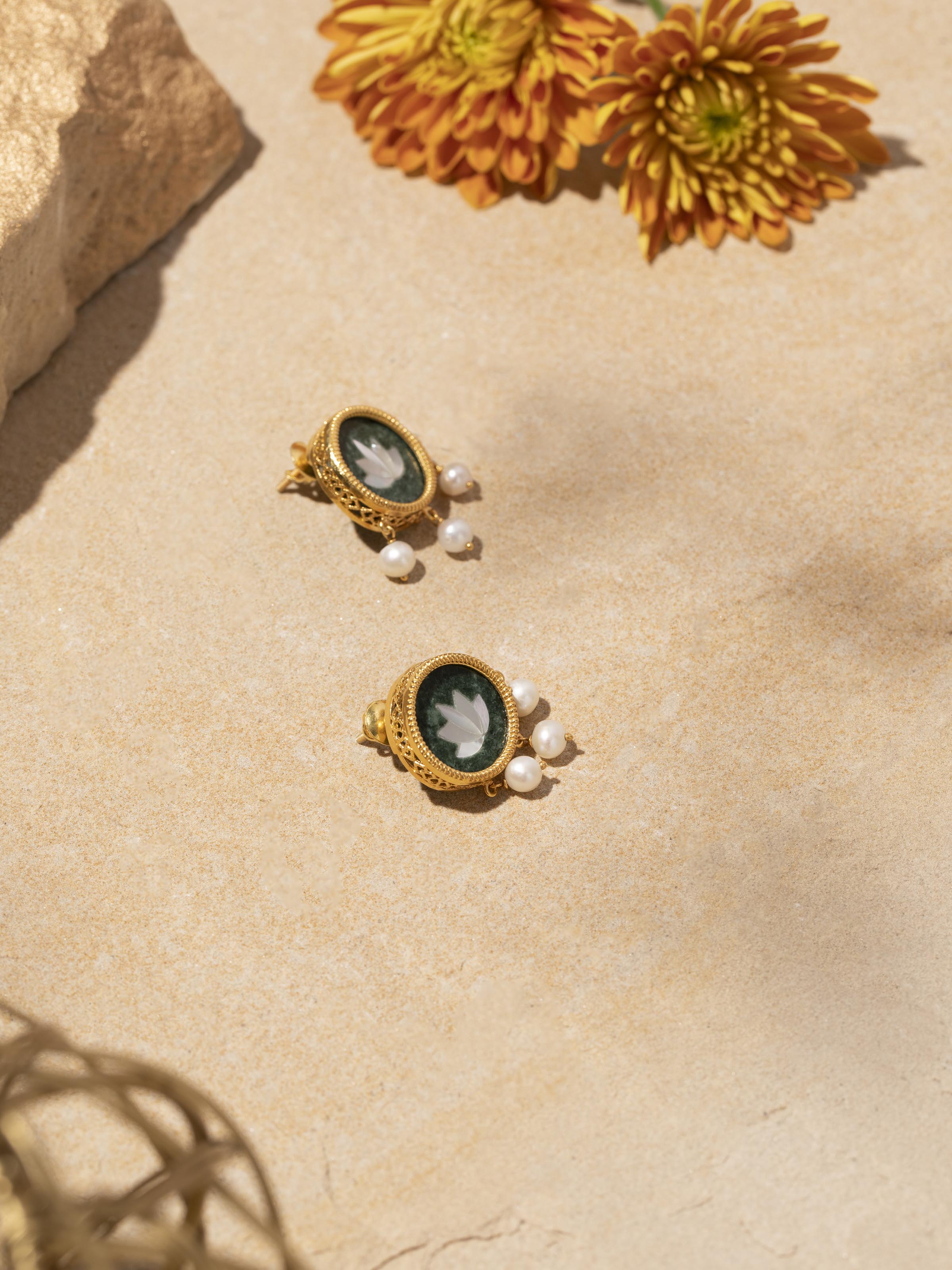 Lifestyle view of Parchinkari earrings styled with ethnic wear to highlight traditional charm.