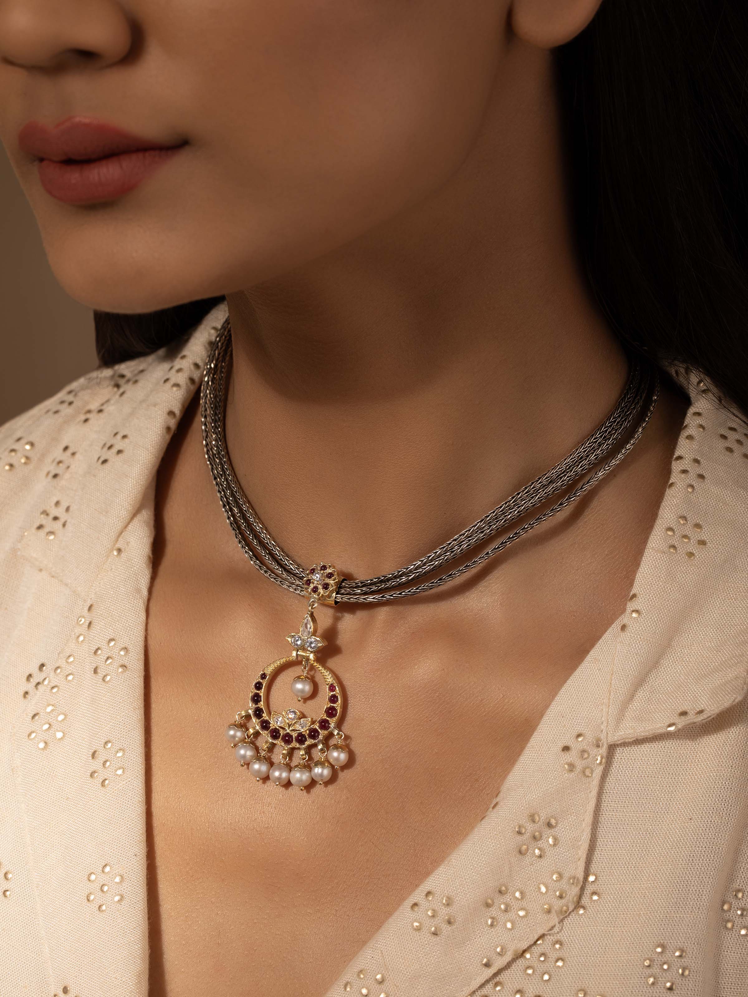 Side view of Silver Collar Necklace emphasizing its elegant shape and smooth finish.
