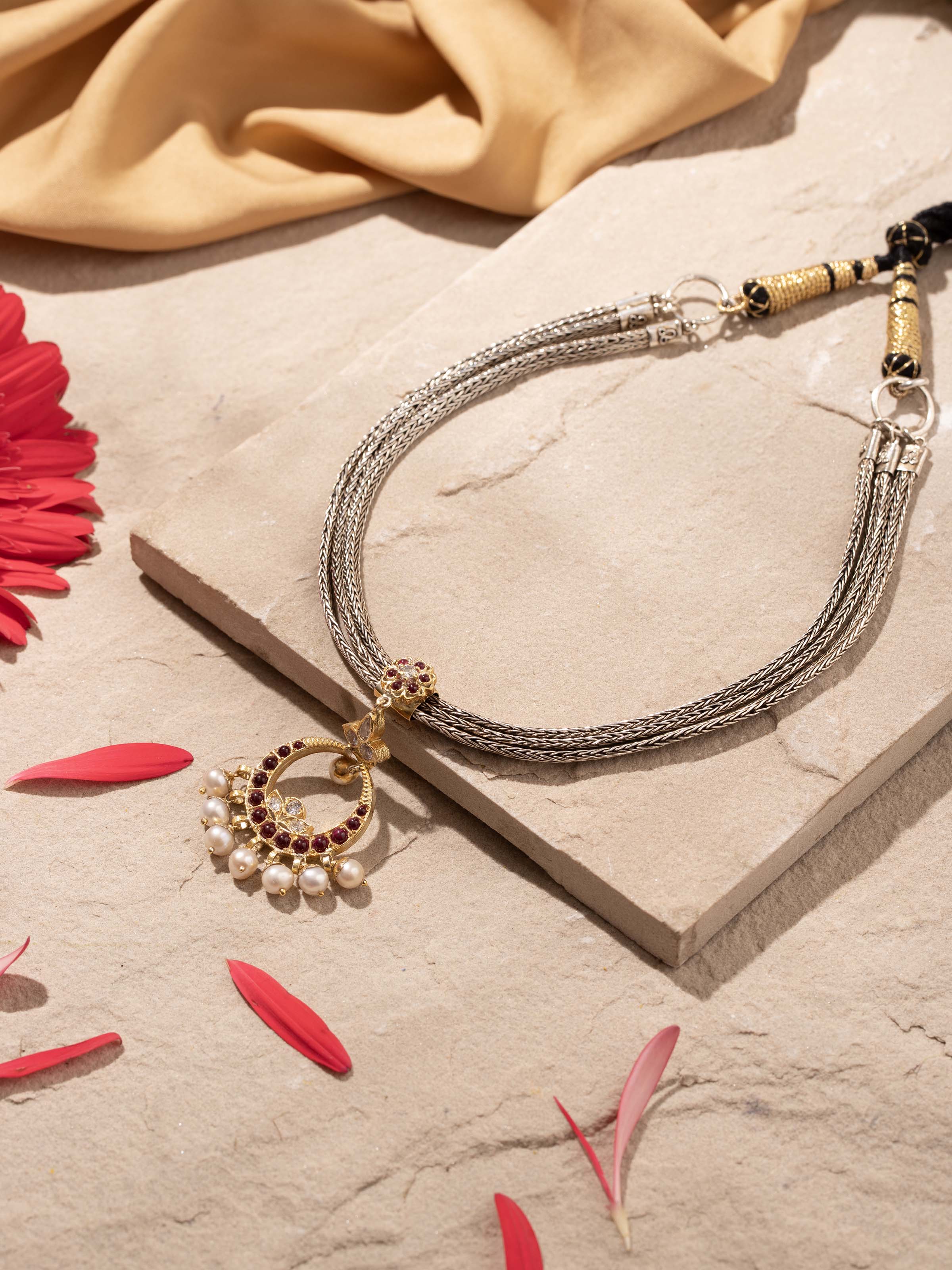 Angled view of Silver Collar Necklace showcasing its sophisticated design and high-quality finish.