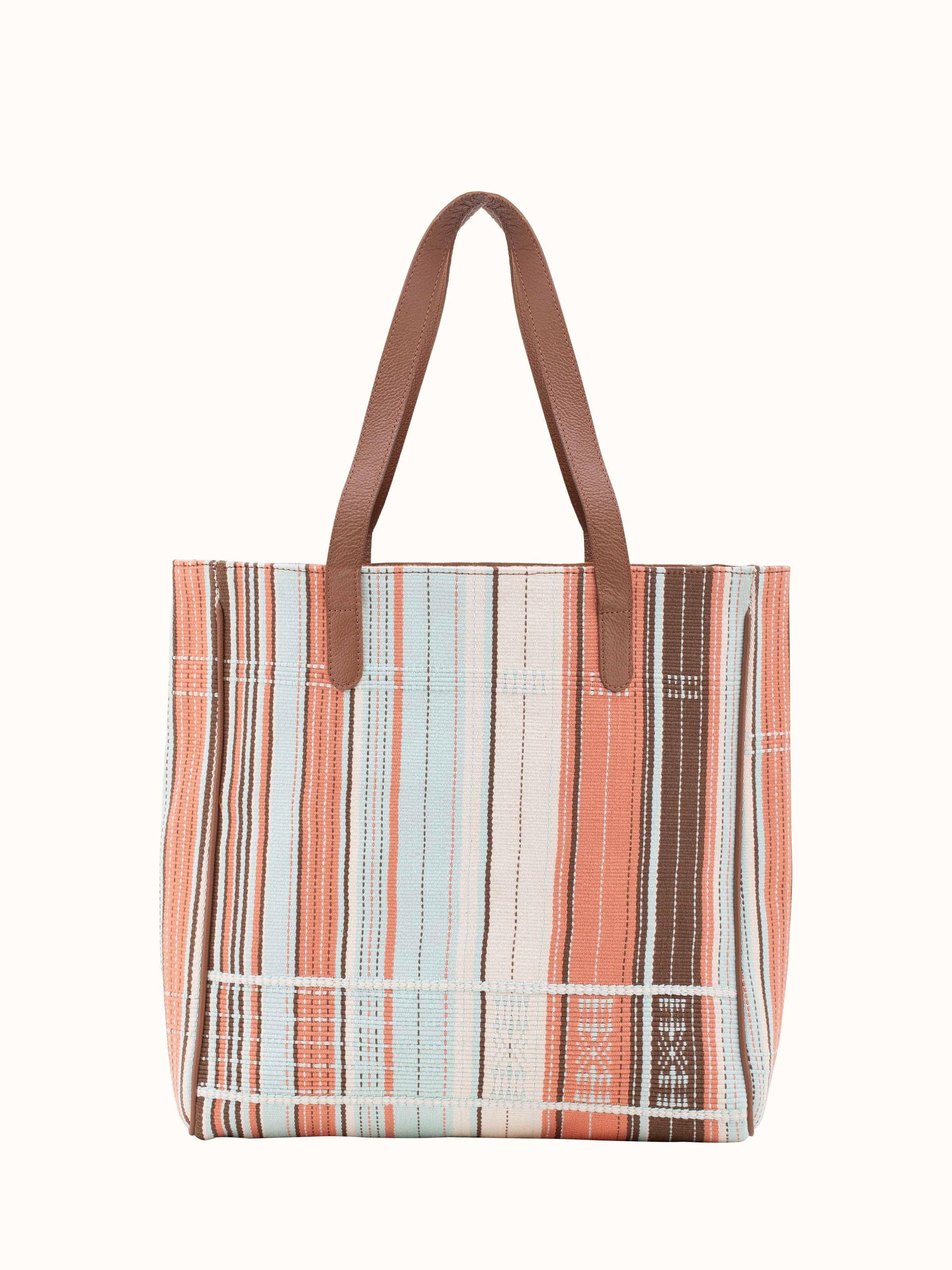 Front view of Leather & textile Nagaland loin loom tote bag with detailed loom work