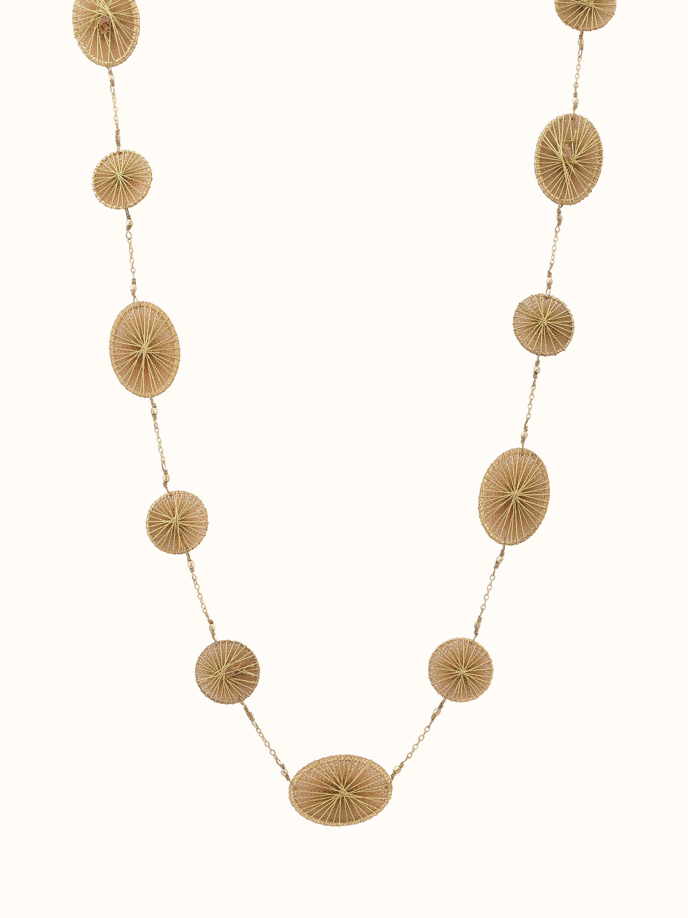 Front view of string craft long necklace featuring a unique and colorful design