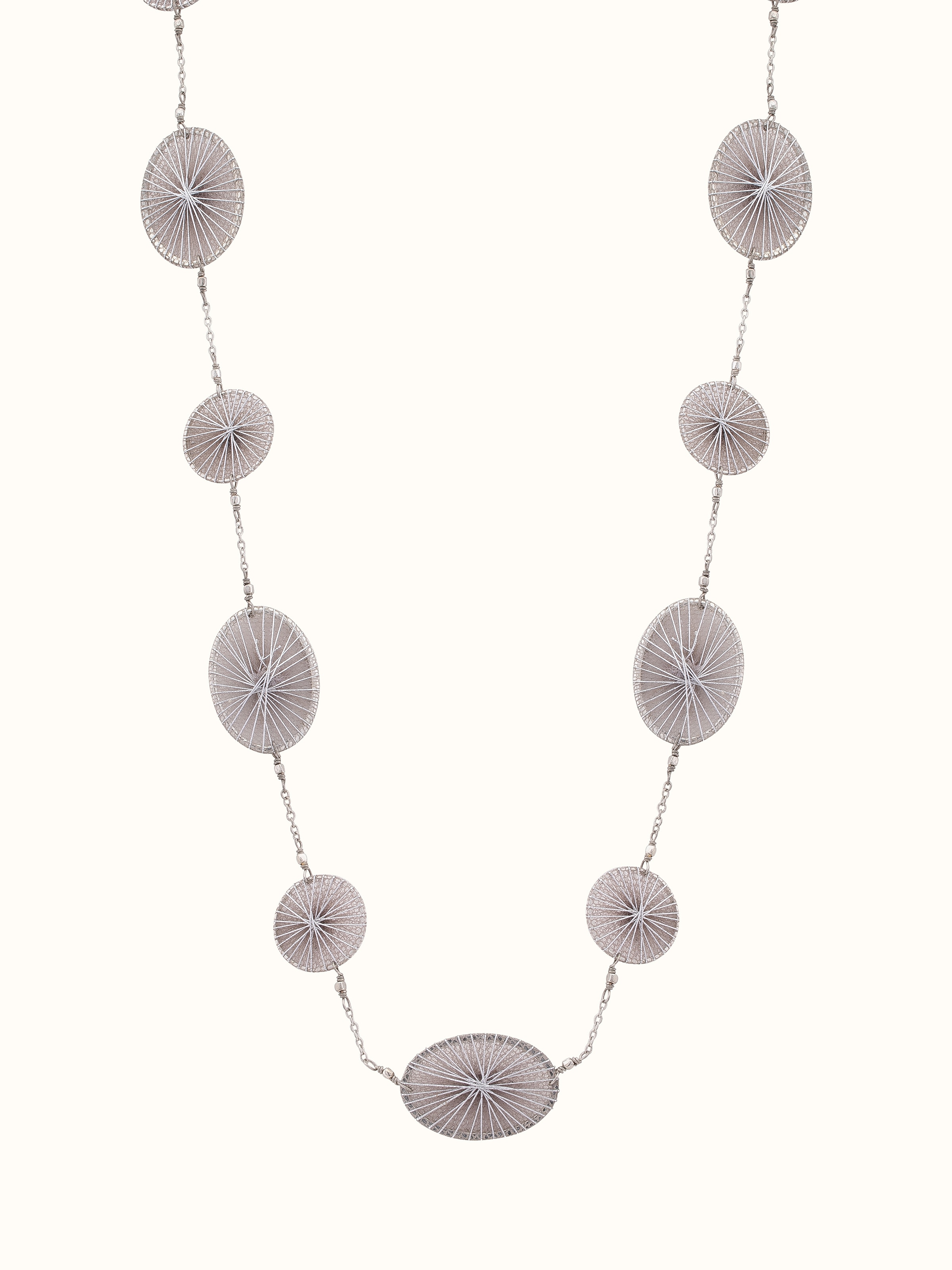 Front view of String Craft Long Necklace featuring vibrant string work with intricate design and colorful details.