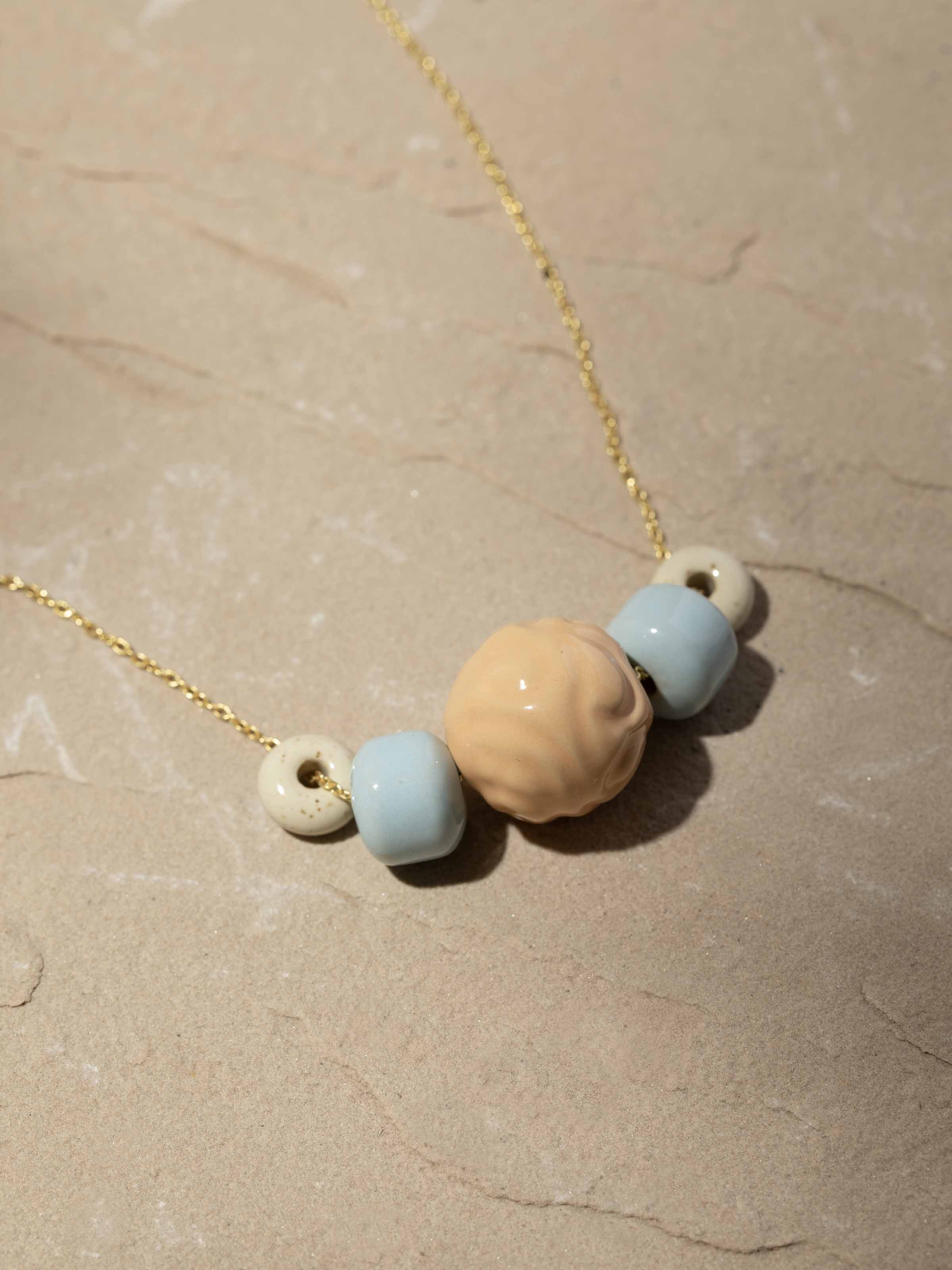 Top view of Ceramic long necklace emphasizing unique craftsmanship