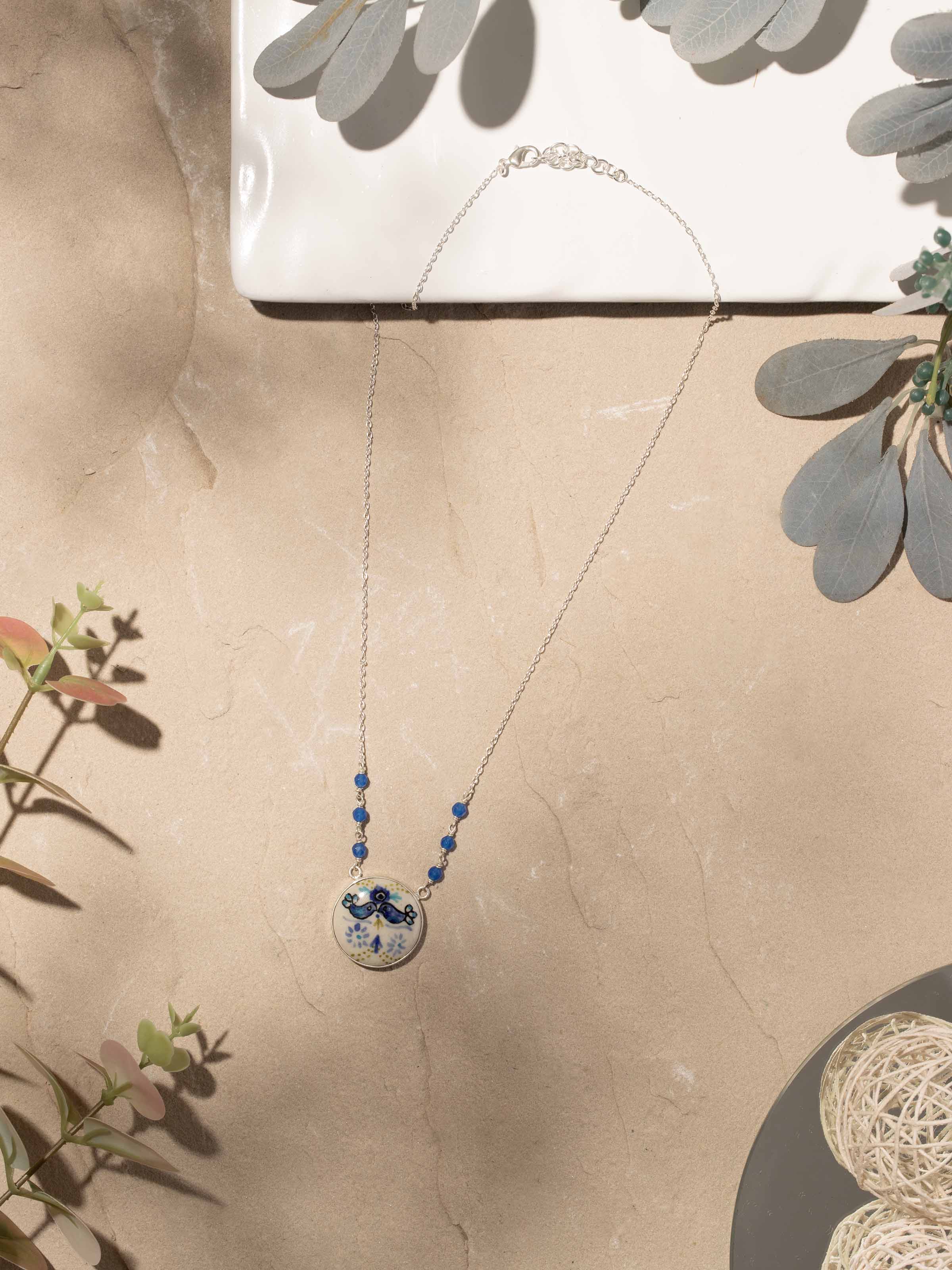 Side view of Ceramic Long Necklace emphasizing its vibrant colors and design.