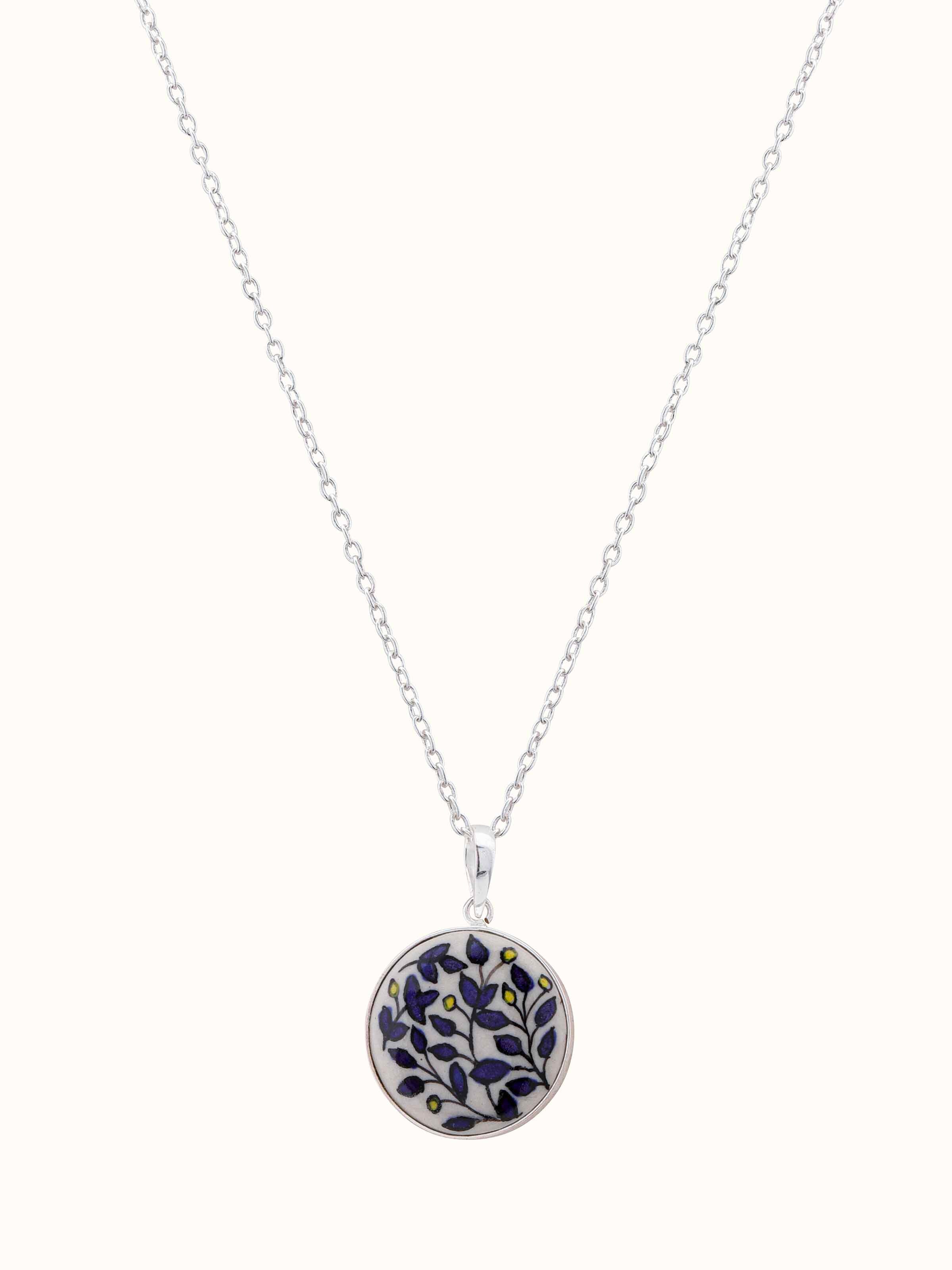 Front view of ceramic pendant & chain featuring a vibrant hand-painted design