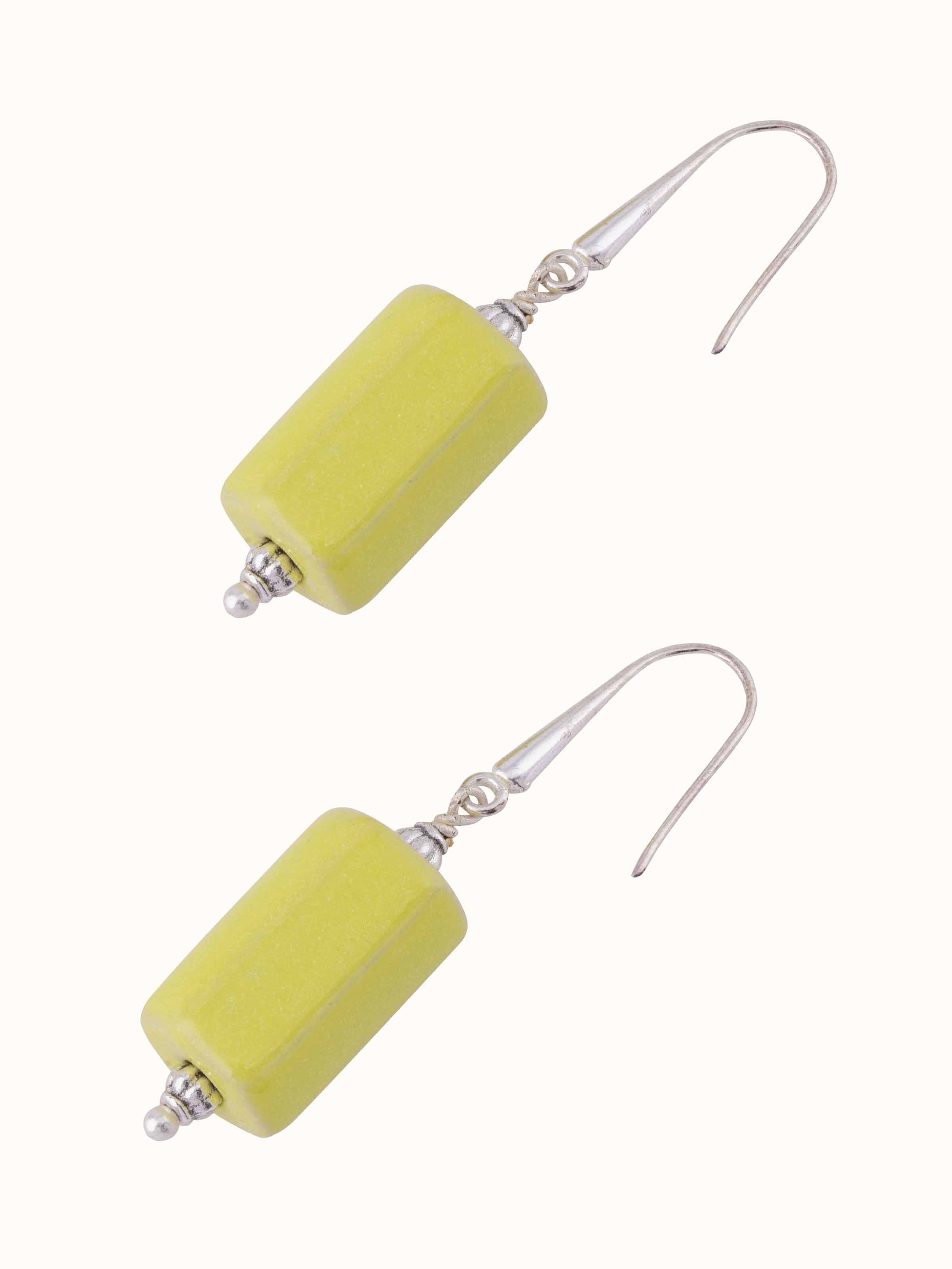 Angled view of Ceramic drop earrings showcasing their distinctive shape and high-quality ceramic finish