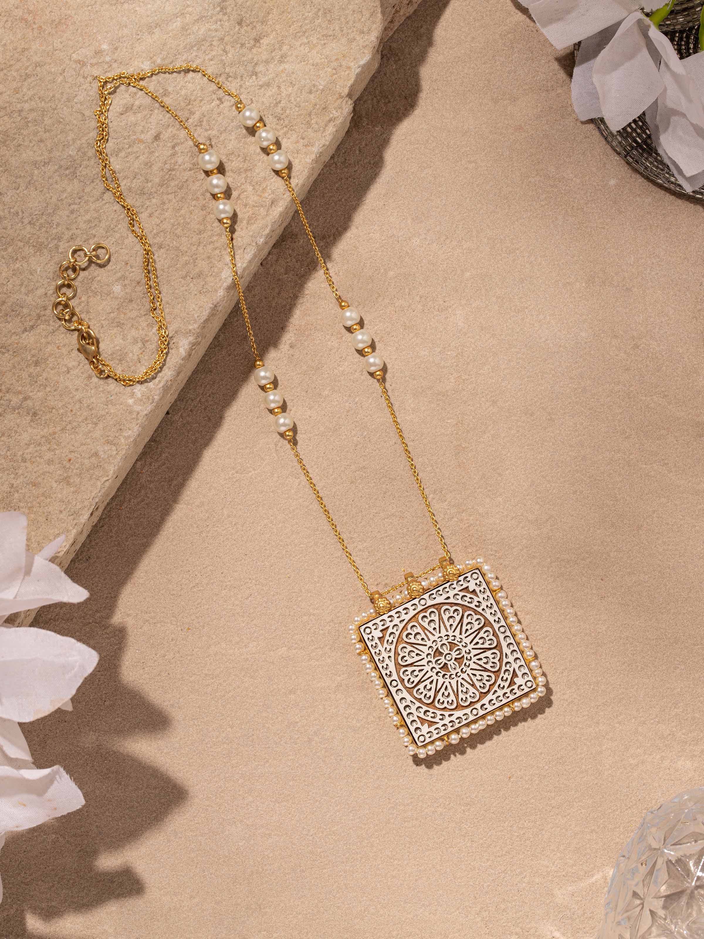 Close-up of Wood Block Carving Long Necklace showing intricate woodwork