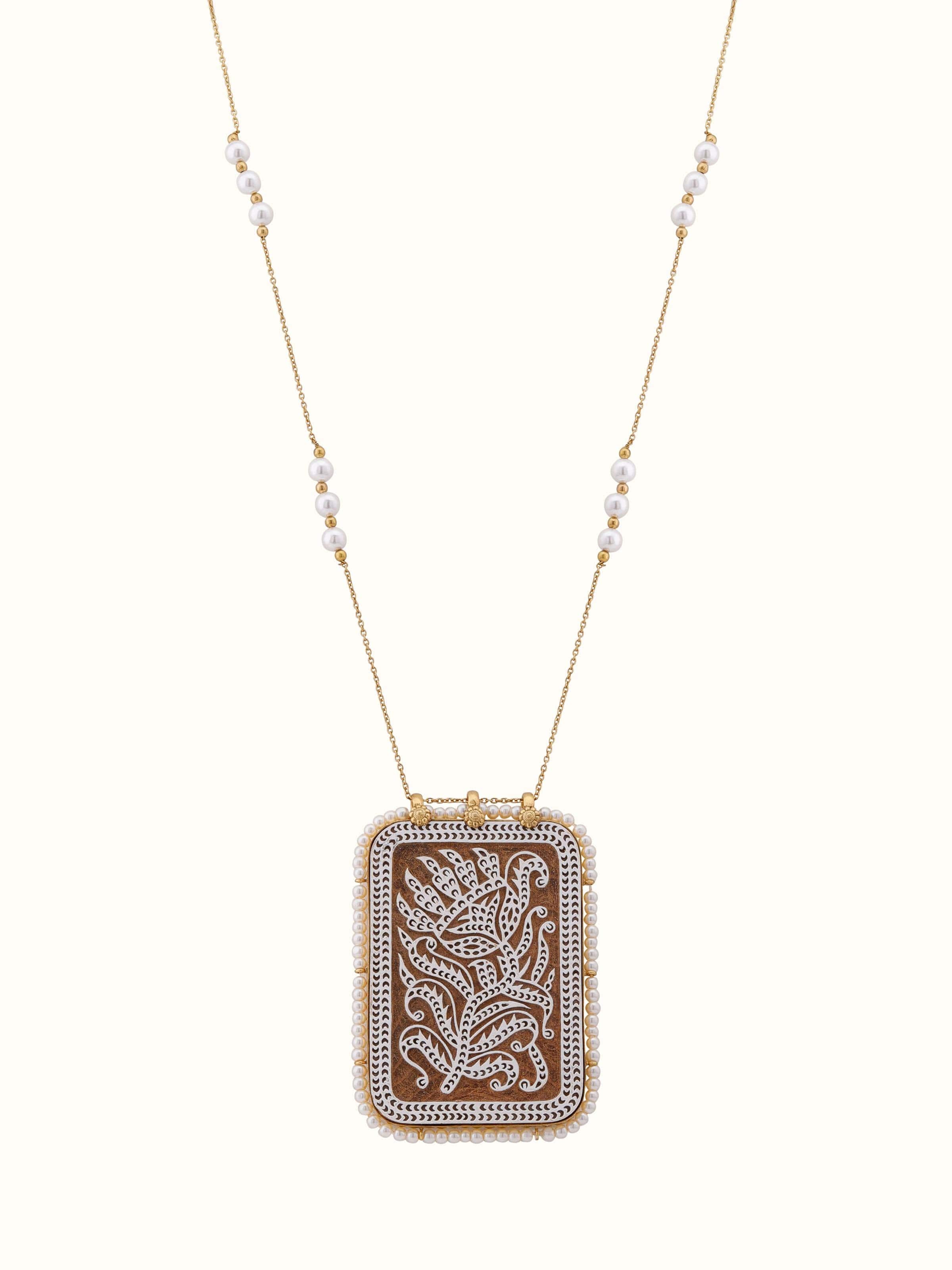 Front view of Wood Block Carving Long Necklace showcasing intricate wood block carvings and elegant design.