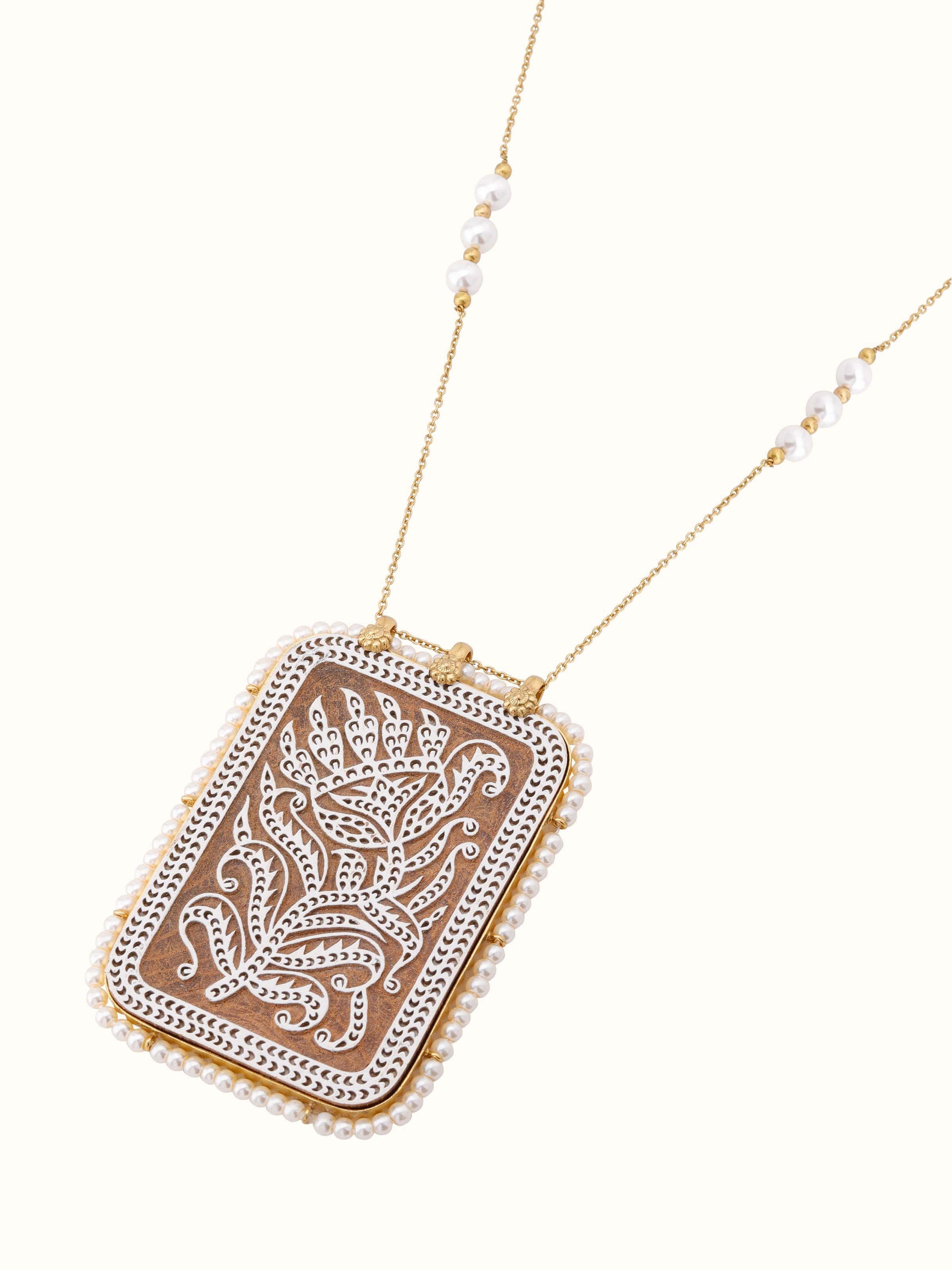 Detailed view of Wood Block Carving Long Necklace from a distance, highlighting its full length and intricate carvings.