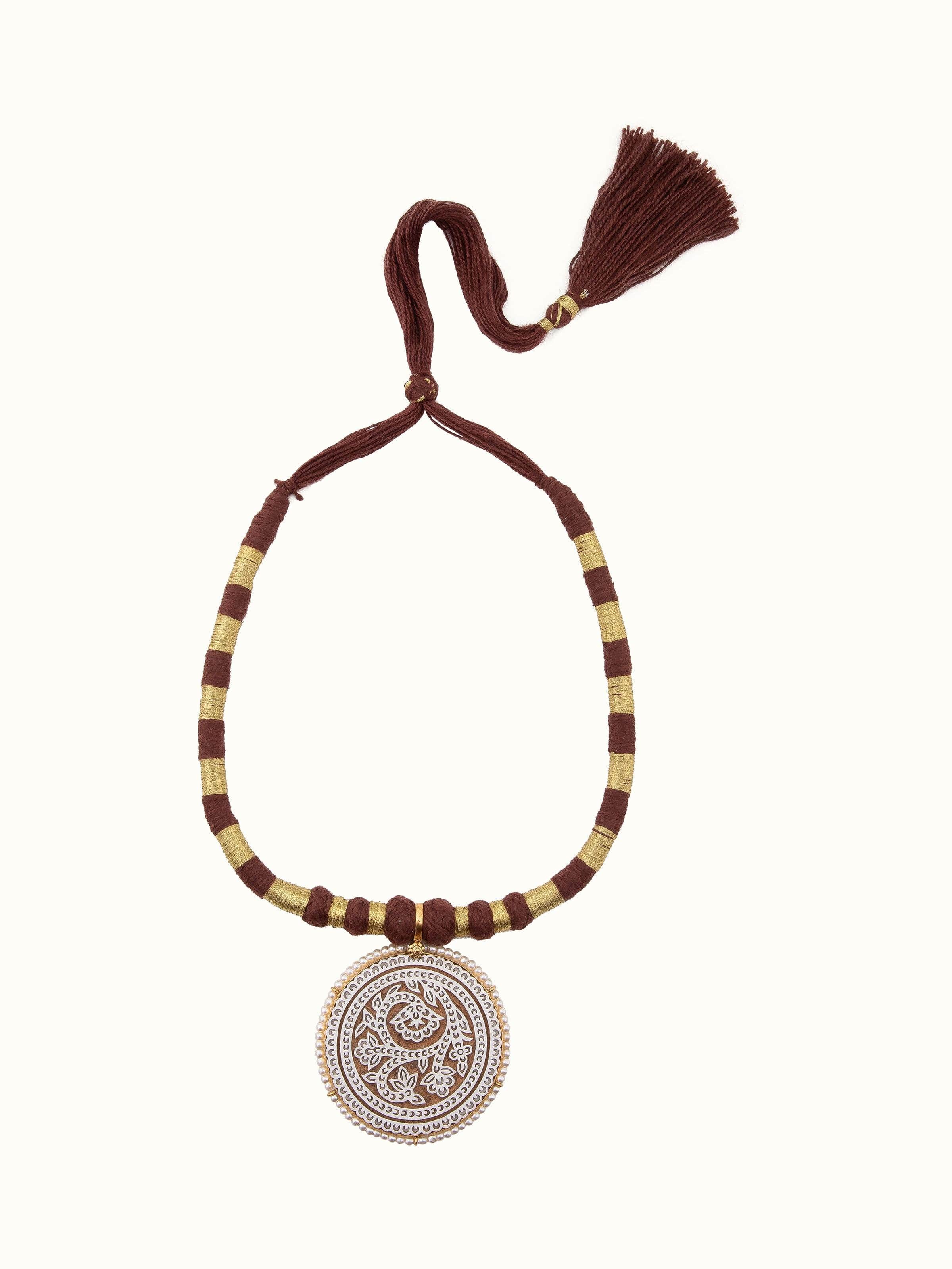 Front view of Wood Block Carving Collar Necklace showcasing intricate carvings