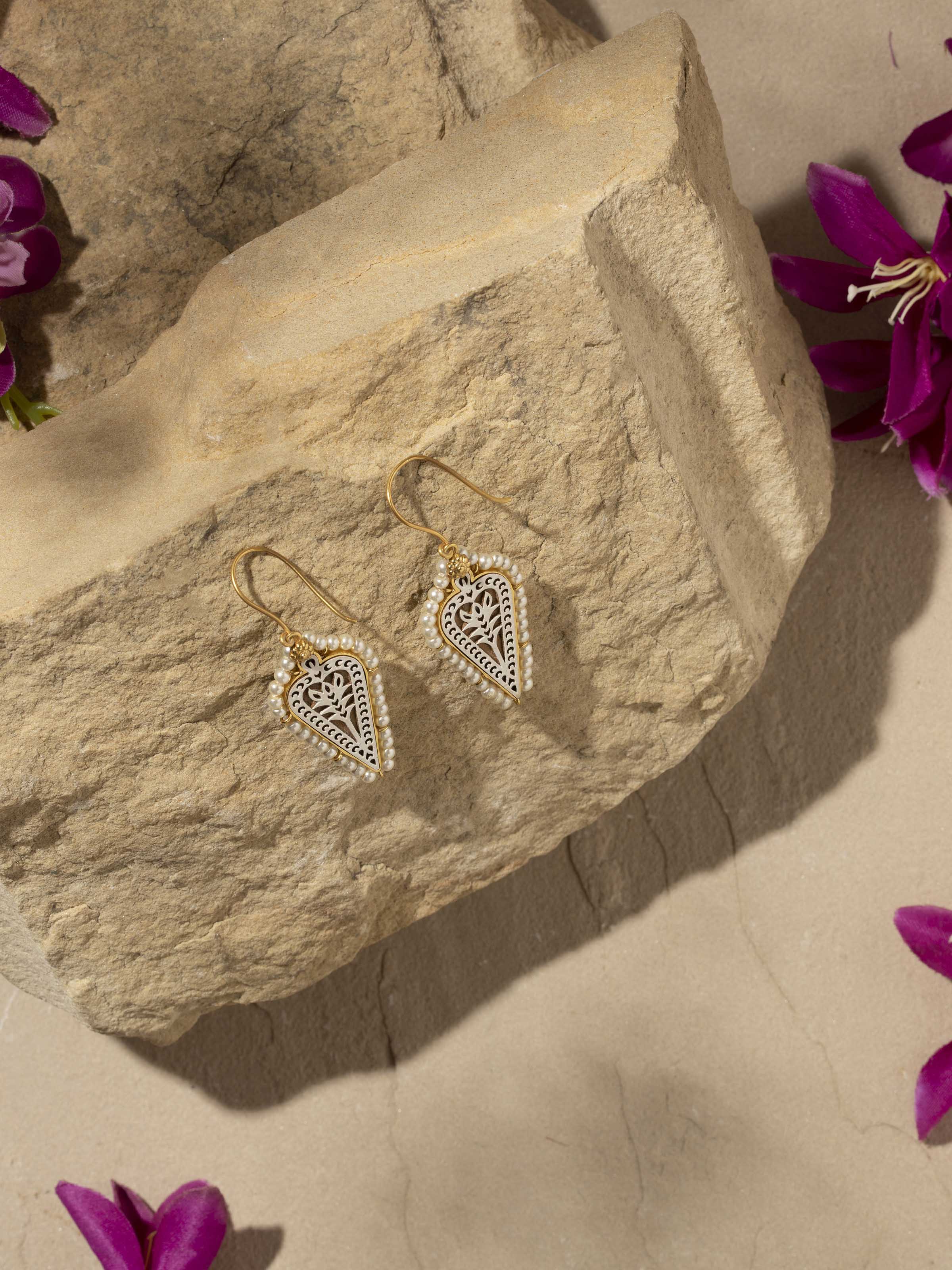 Close-up view of Wood Block Carving Drop Pair Earrings highlighting the detailed carving and wood texture.