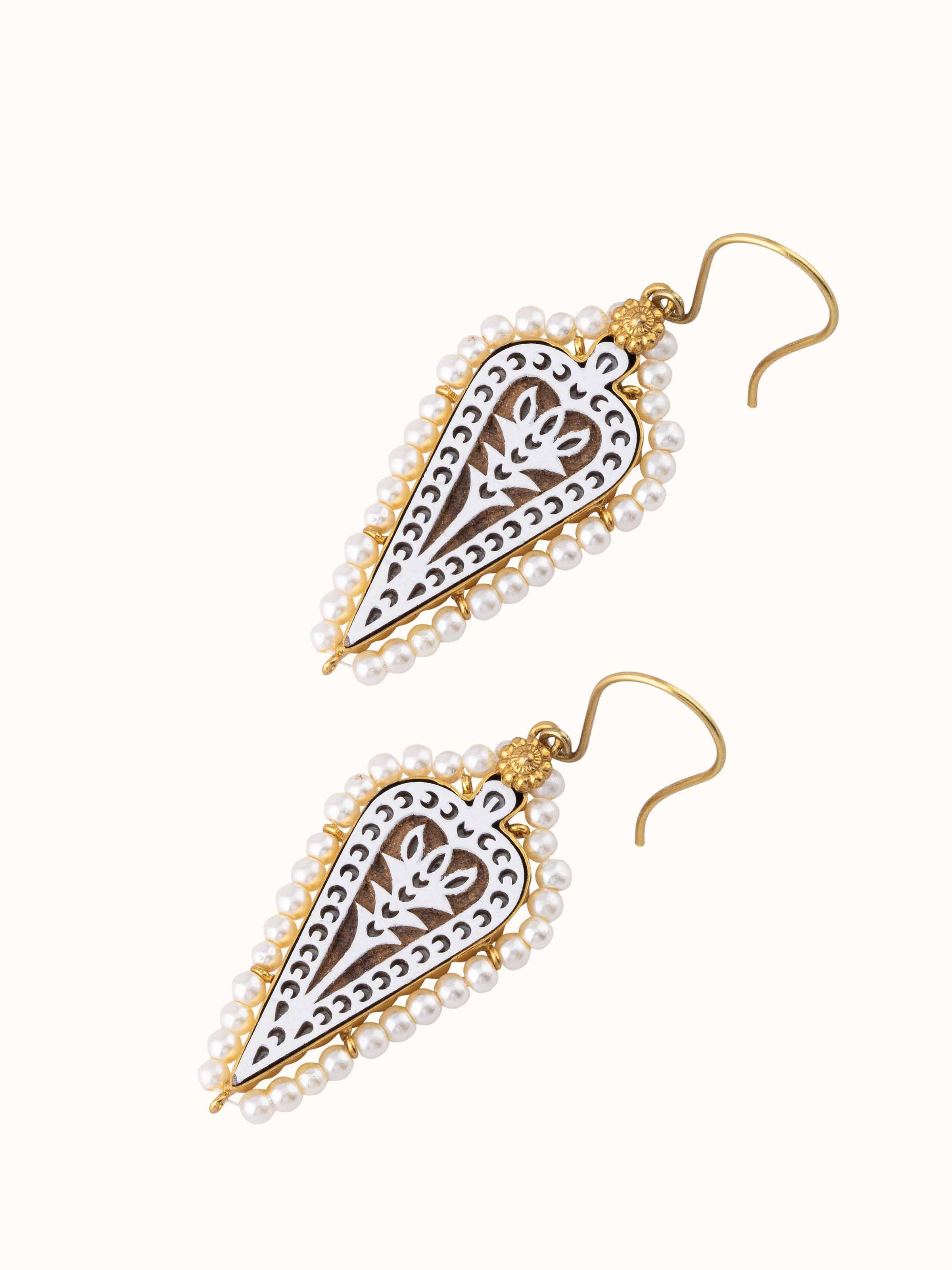 Angled view of Wood Block Carving Drop Pair Earrings showcasing the intricate design and craftsmanship.