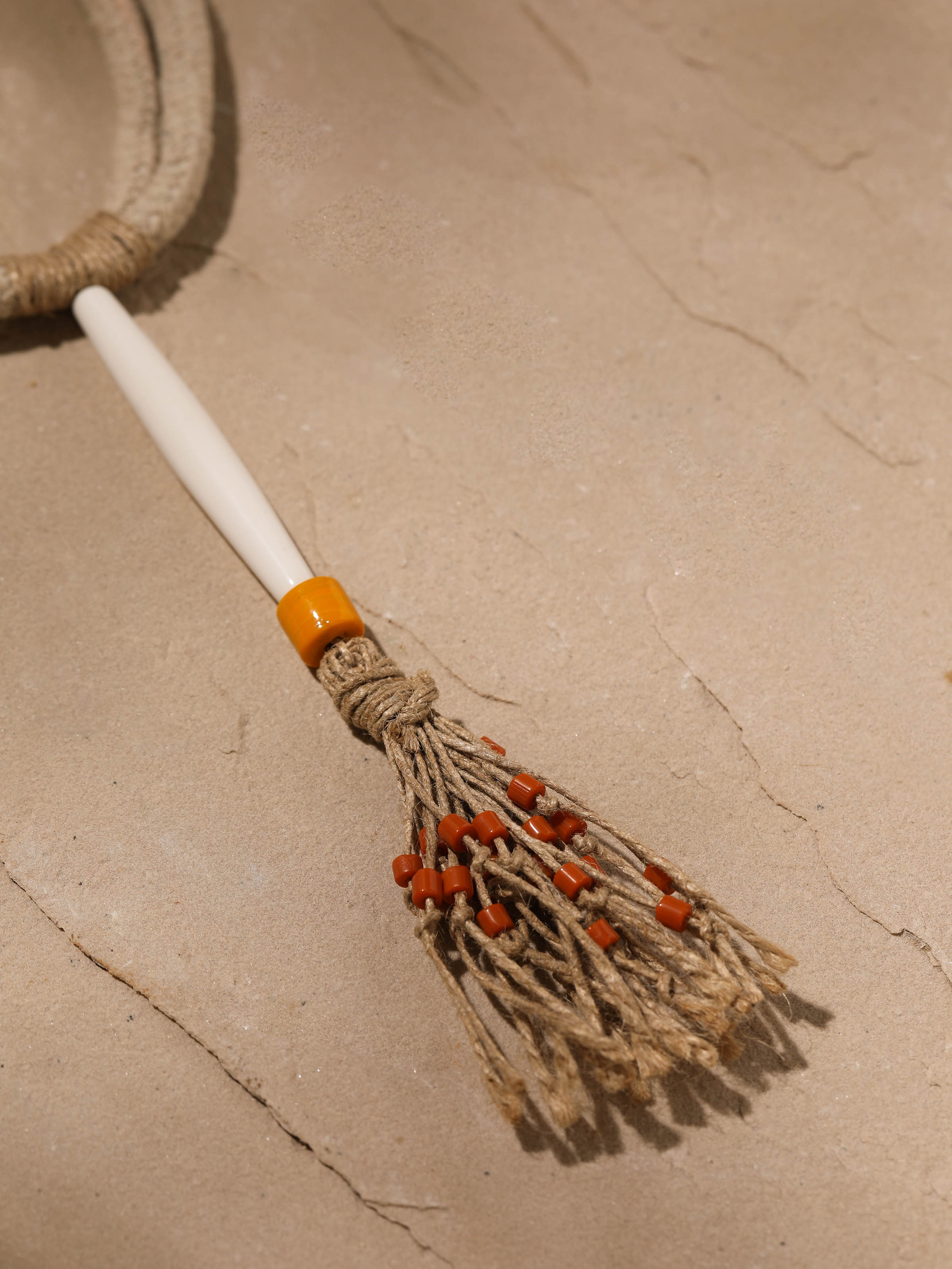 Back view of Cotton Chords & Faux Bones Collar Necklace illustrating the clasp and overall design.