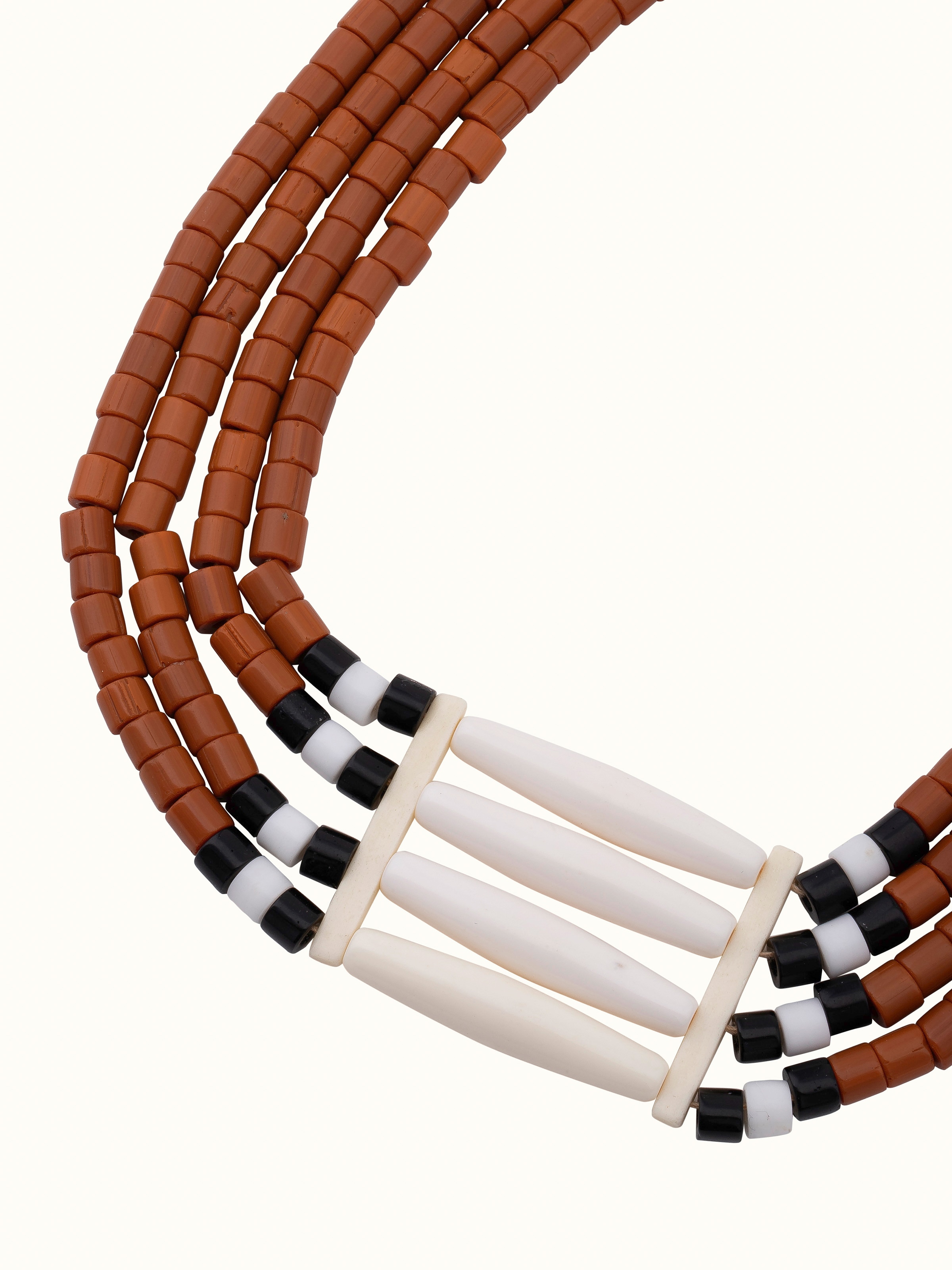 Overview of beads and faux bones collar necklace showing detailed design
