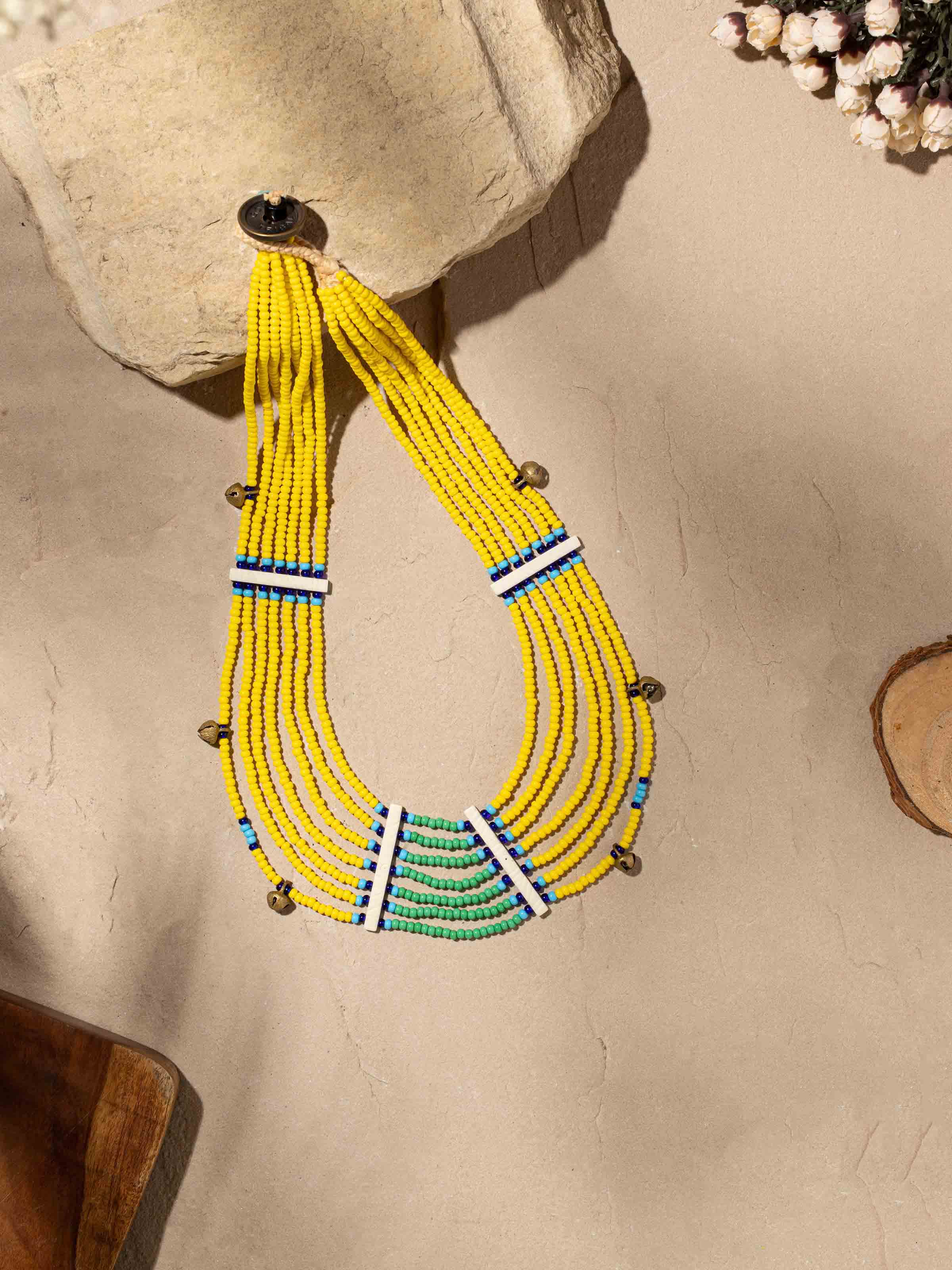 Close-up view of Beads & Faux Bones Collar Necklace featuring intricate beadwork and faux bone accents.