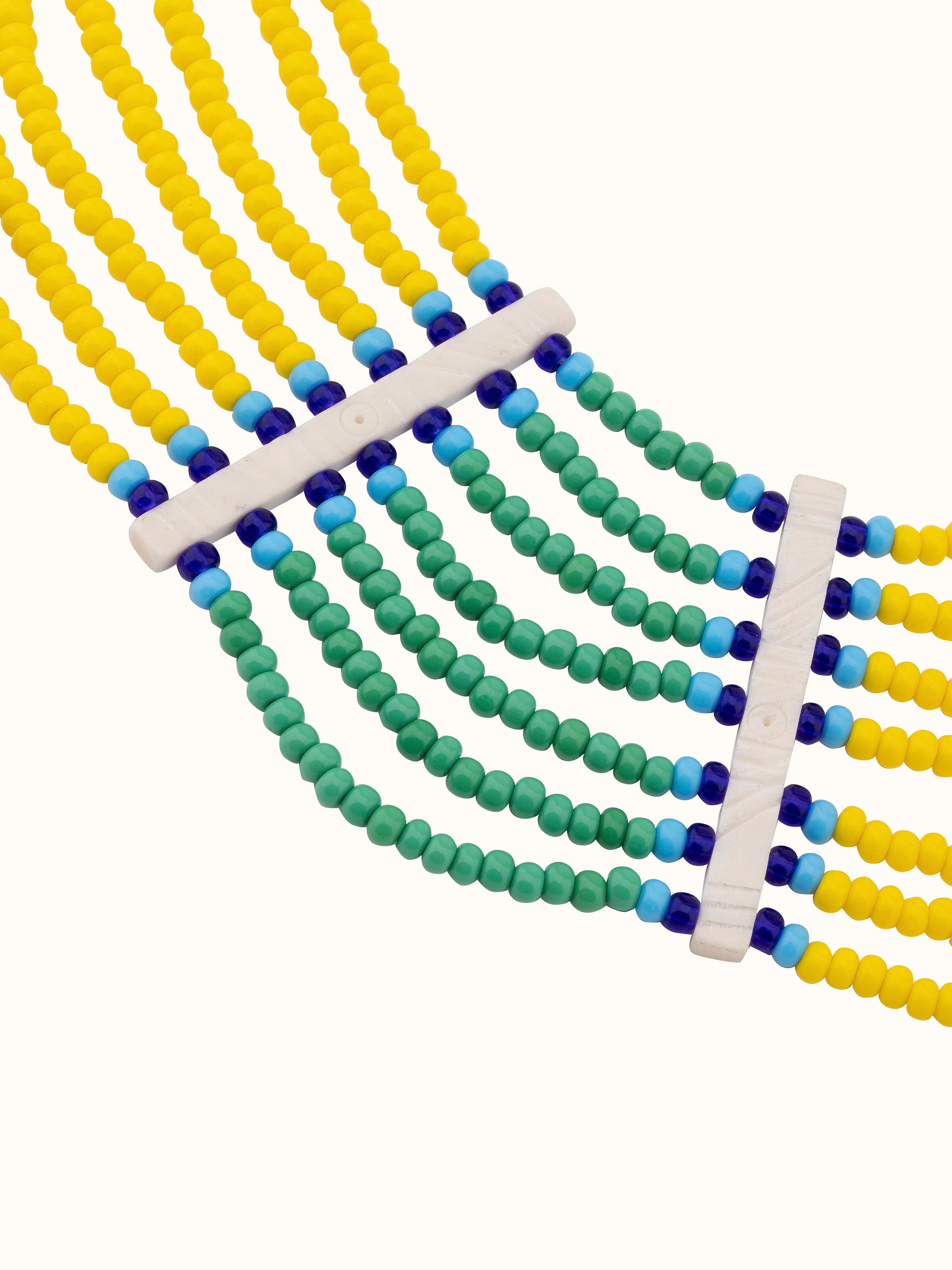 Back view of Beads & Faux Bones Collar Necklace showing the smooth finish and secure clasp.