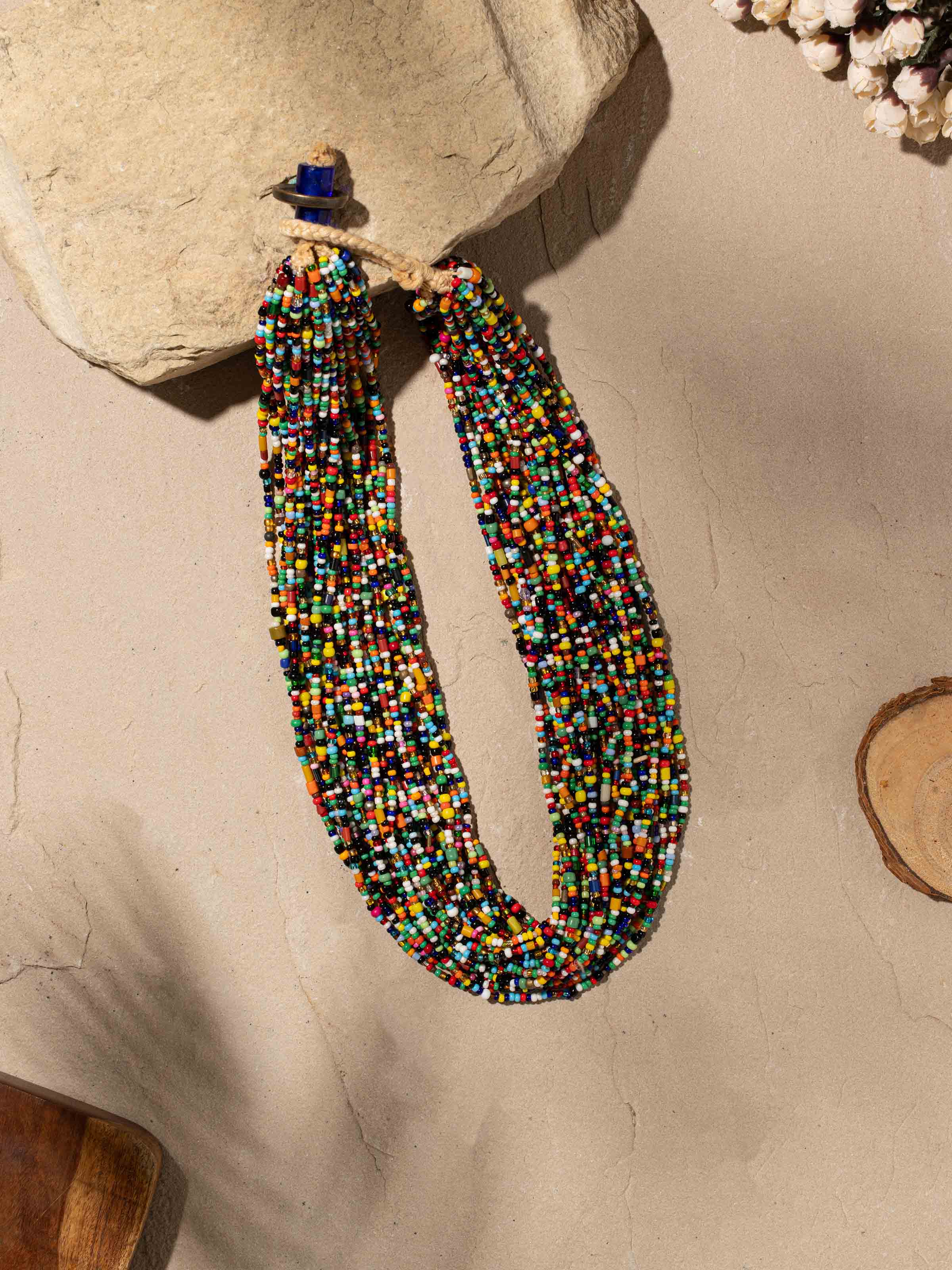 Side view of bead collar necklace highlighting detailed bead arrangements.