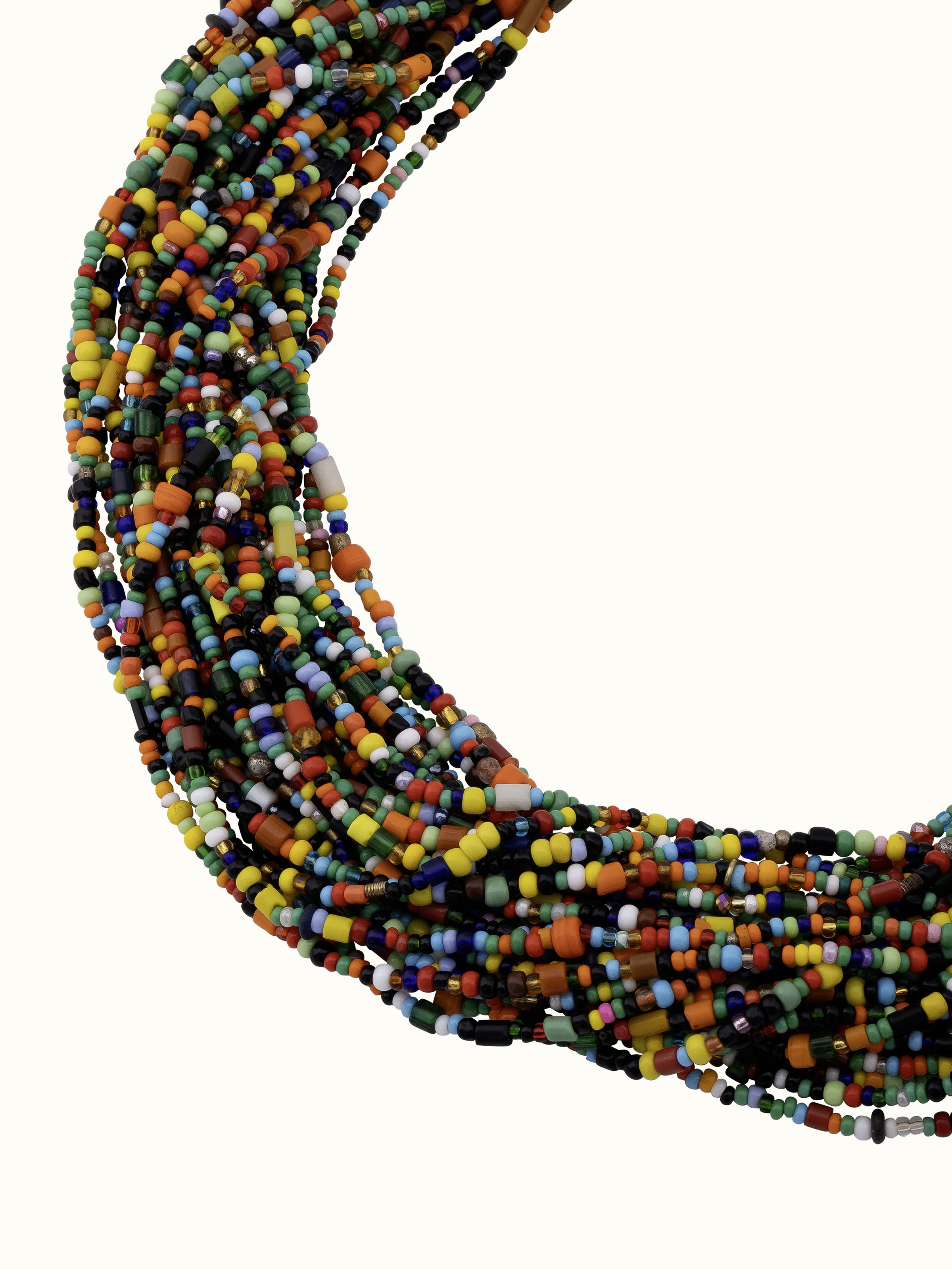 Angled view of bead collar necklace emphasizing colorful bead patterns.