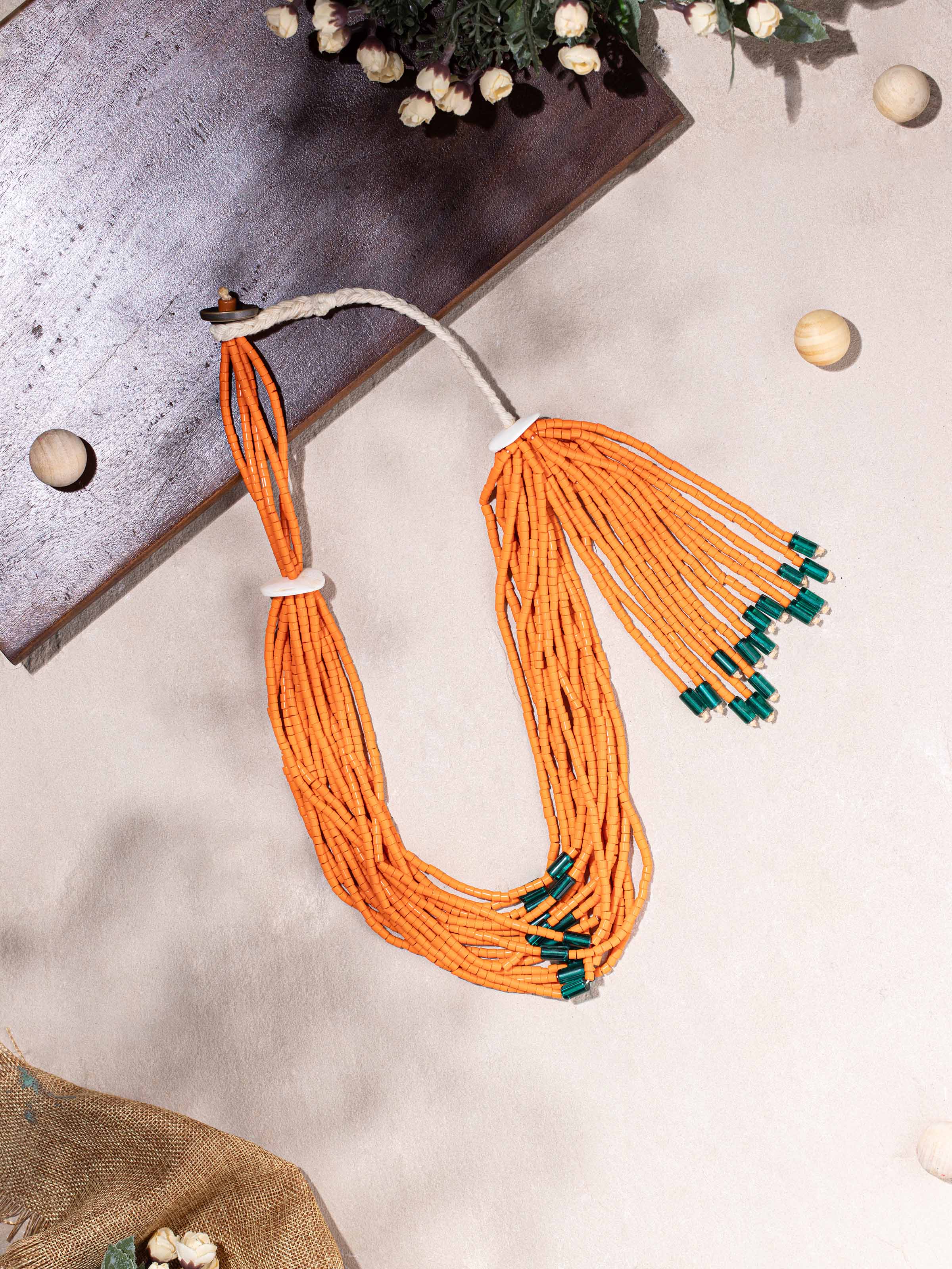 Side view of Bead Long Necklace showcasing its elegant beaded design.