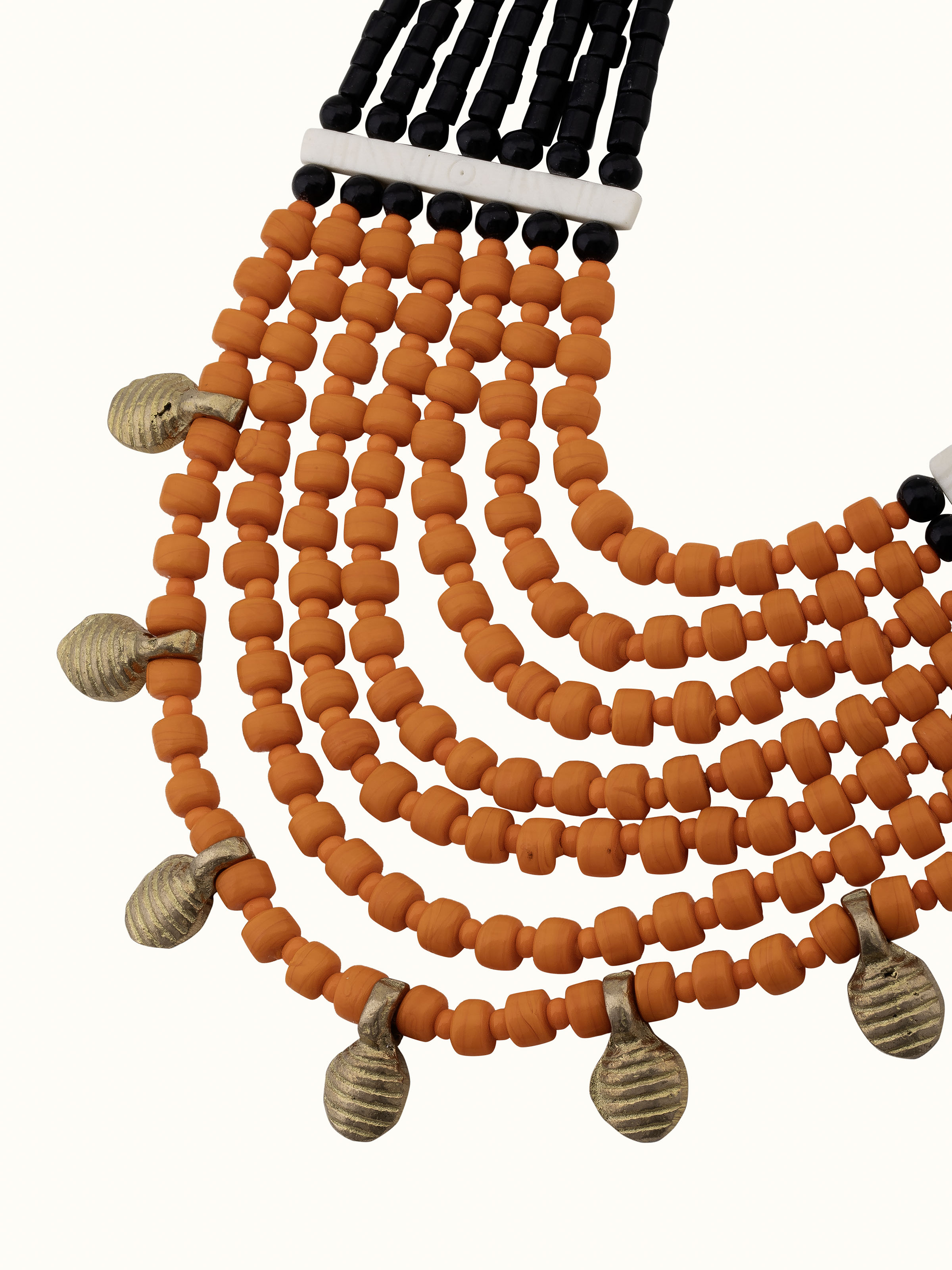 Angled view of Beads & Faux Bones Long Necklace showcasing its intricate arrangement and style.