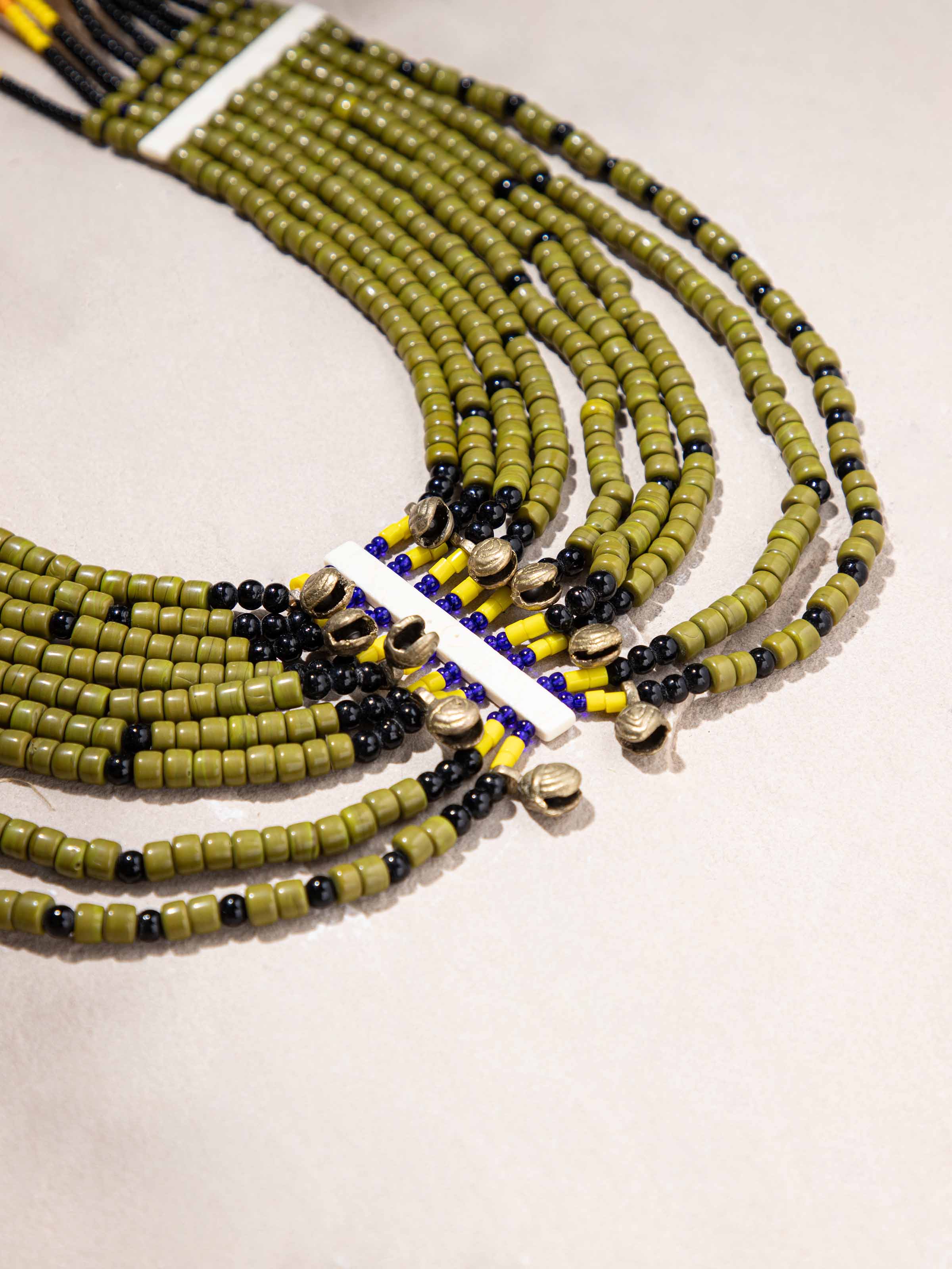 Detailed image of Beads & Faux Bones Long Necklace focusing on the vibrant beadwork and faux bone detailing.