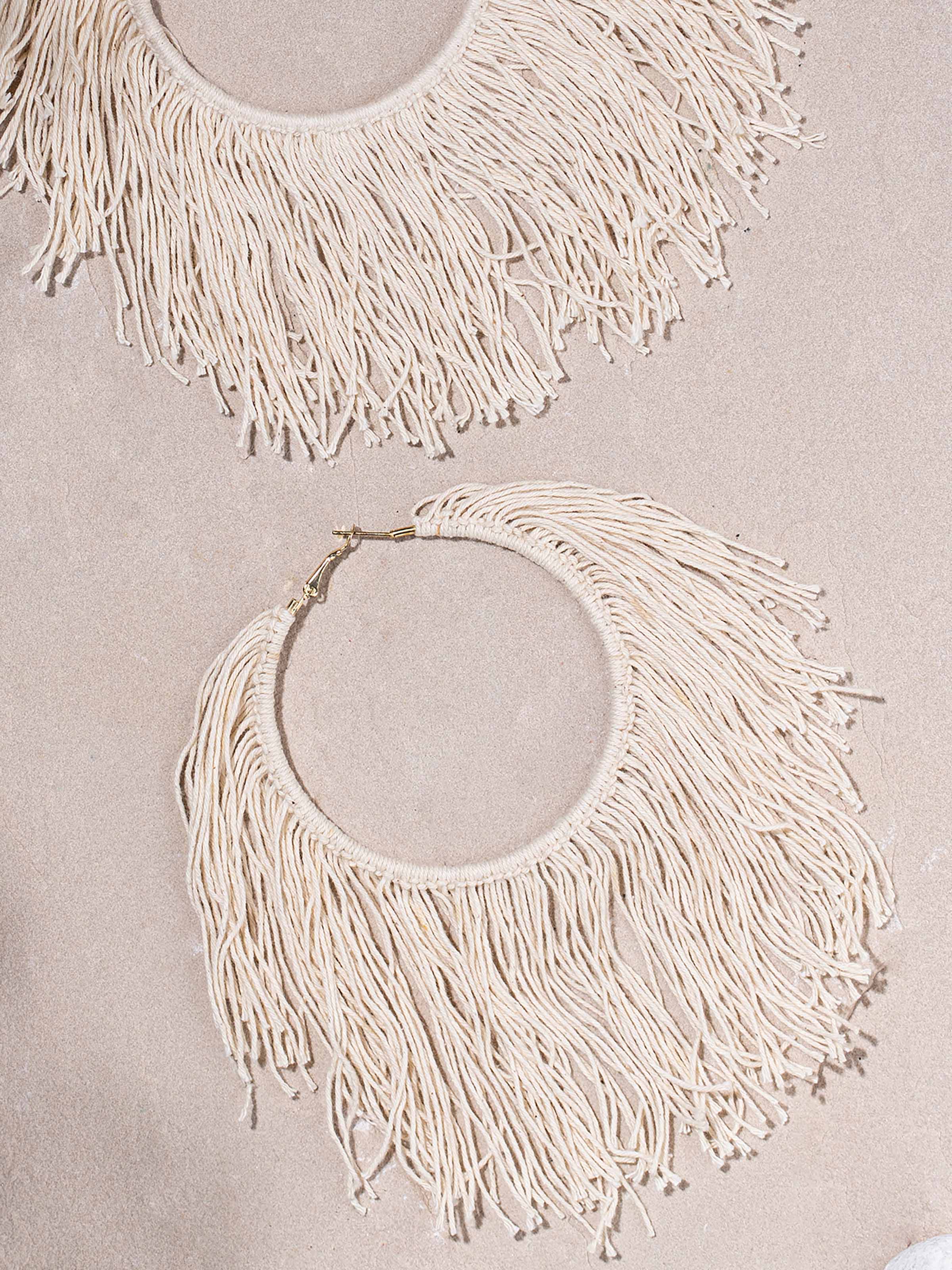 Detailed view of Cotton Chord Hoops from a distance to showcase overall design.