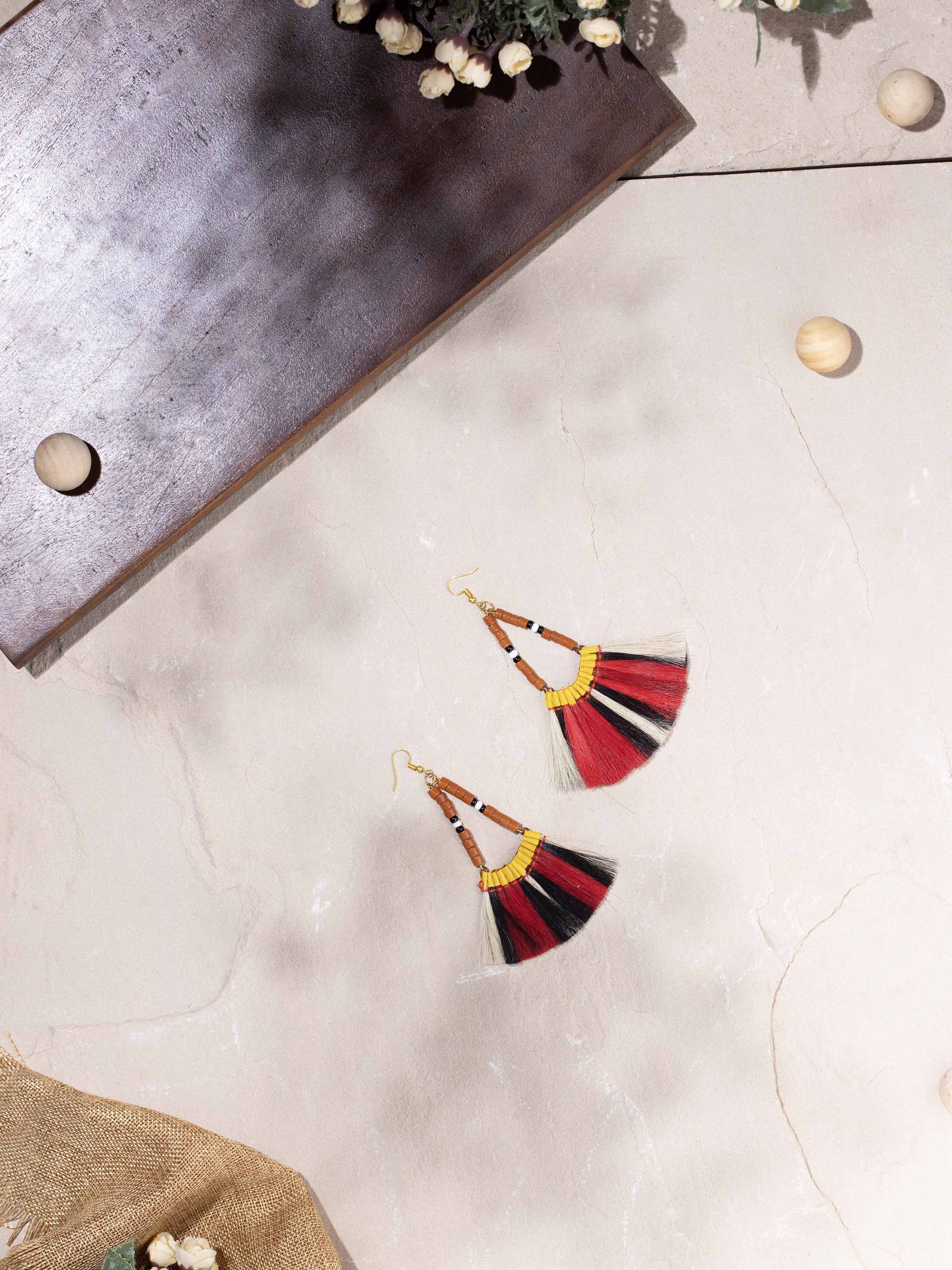 Close-up view of Bead & Dyed Goat Hair Drop Earrings featuring detailed beadwork and dyed goat hair