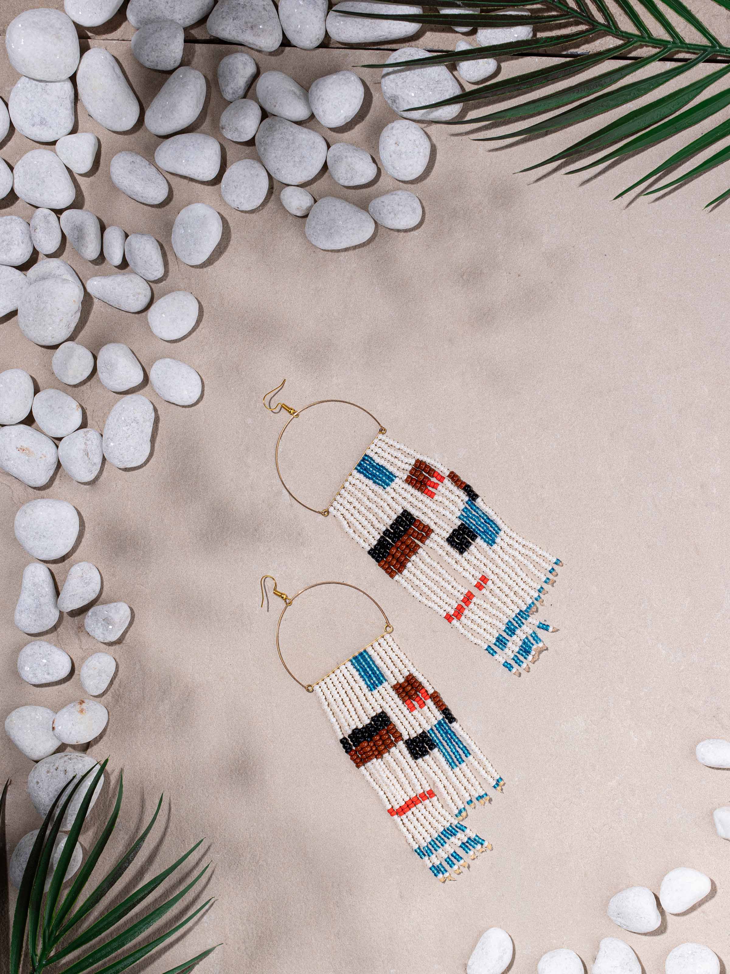 Side view of Bead Drop Earrings showcasing their elegant drop design and bead arrangement.