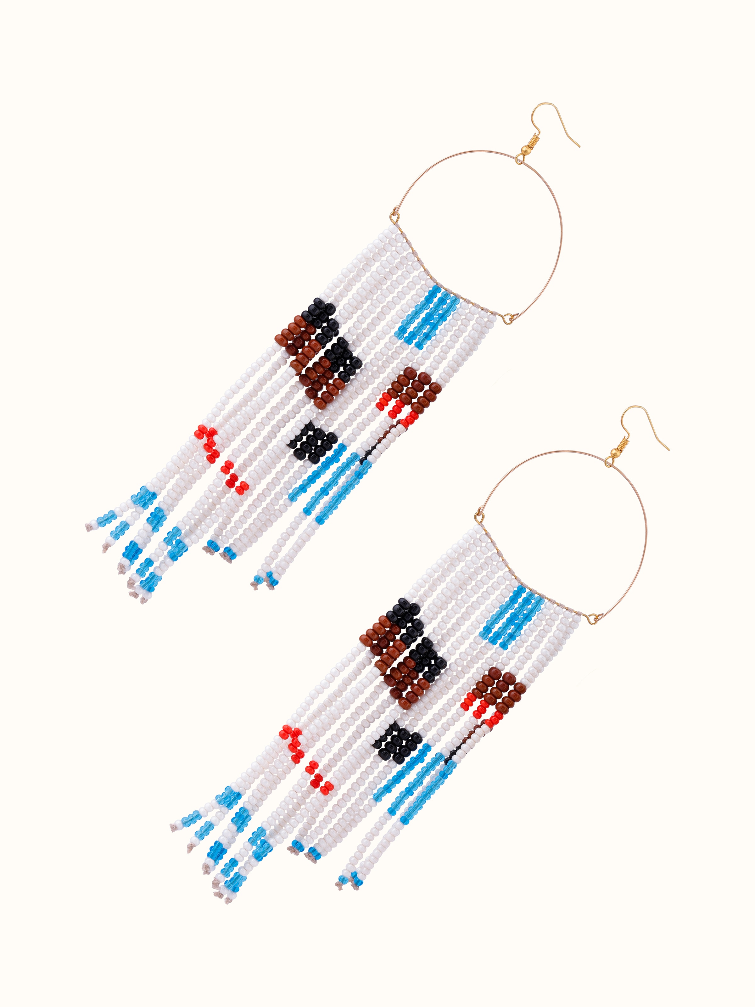 Angled view of Bead Drop Earrings emphasizing their unique design and color contrast.