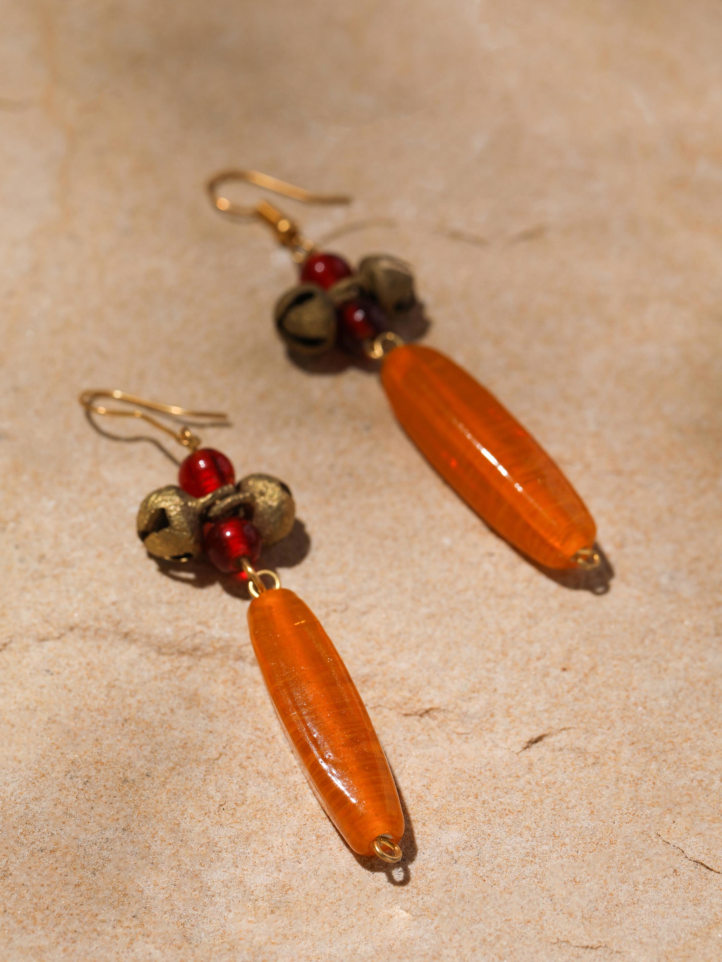 Detailed close-up of bead drop earrings highlighting craftsmanship and bead arrangement