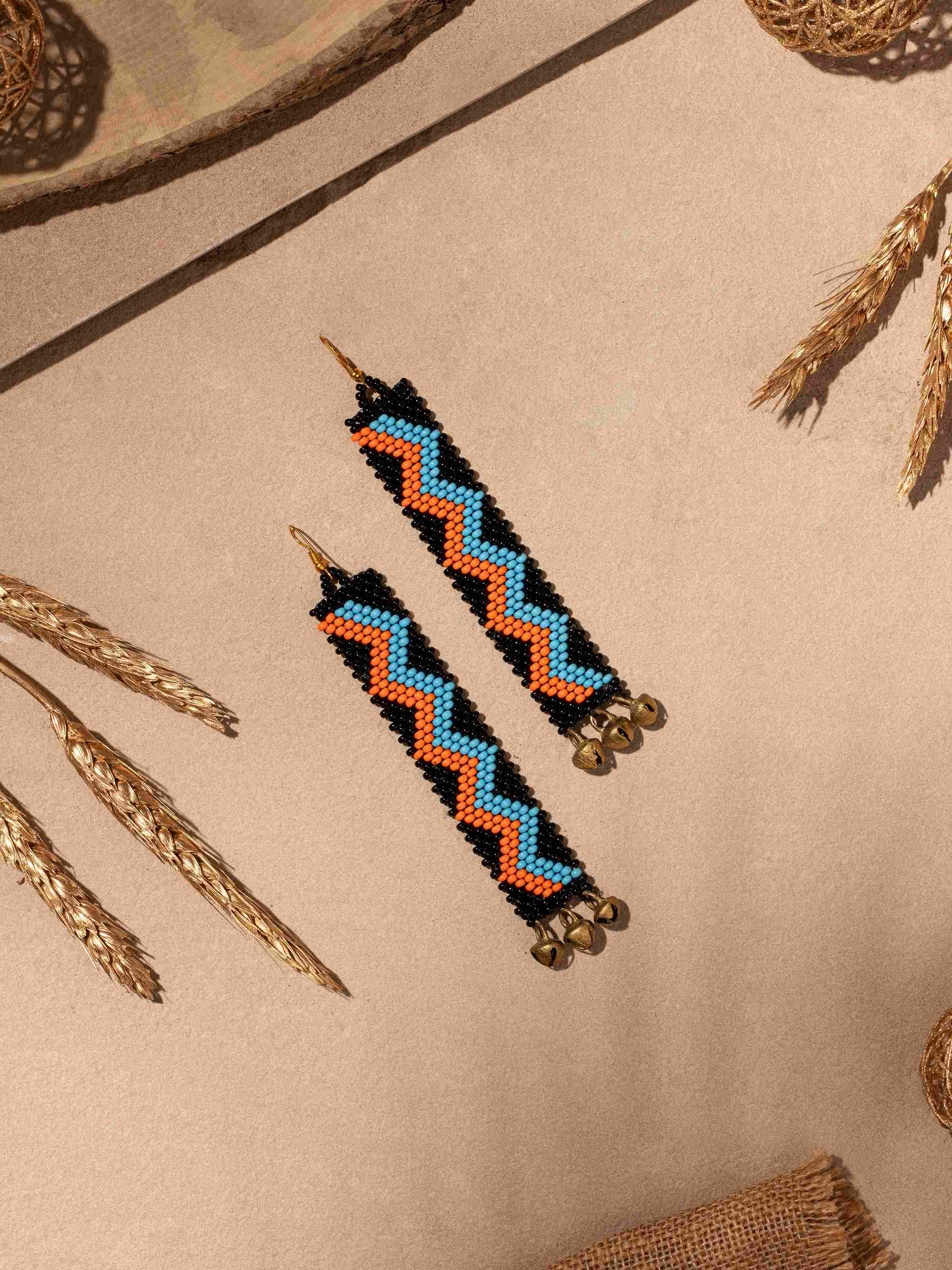 Side view of Bead Drop Earrings emphasizing their elegant drop design.