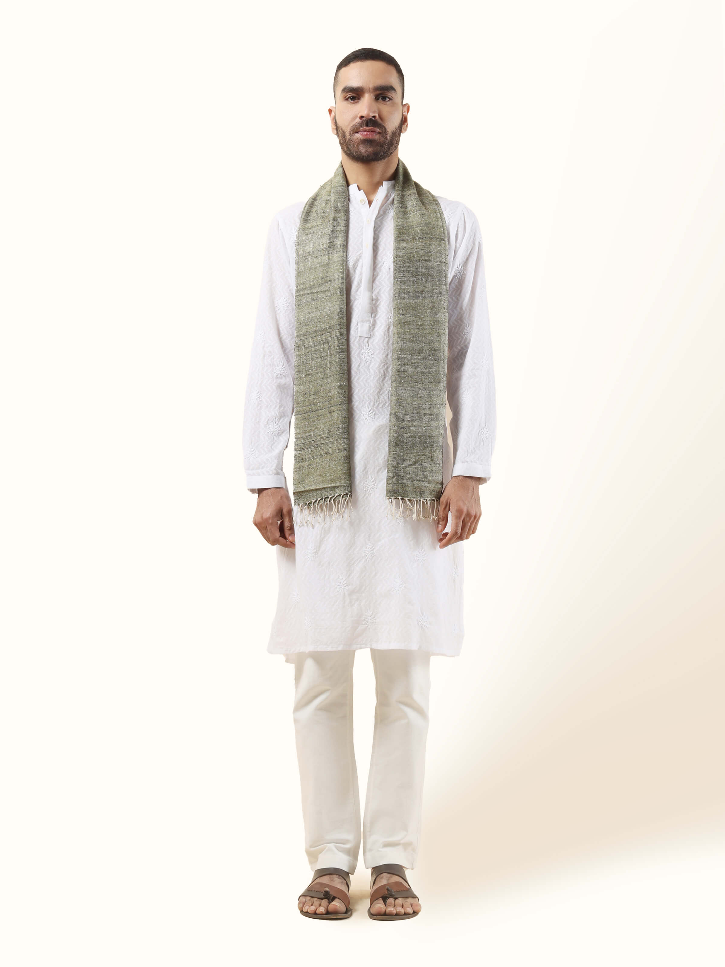 Front view of green Eri silk stole with natural sheen and handwoven texture