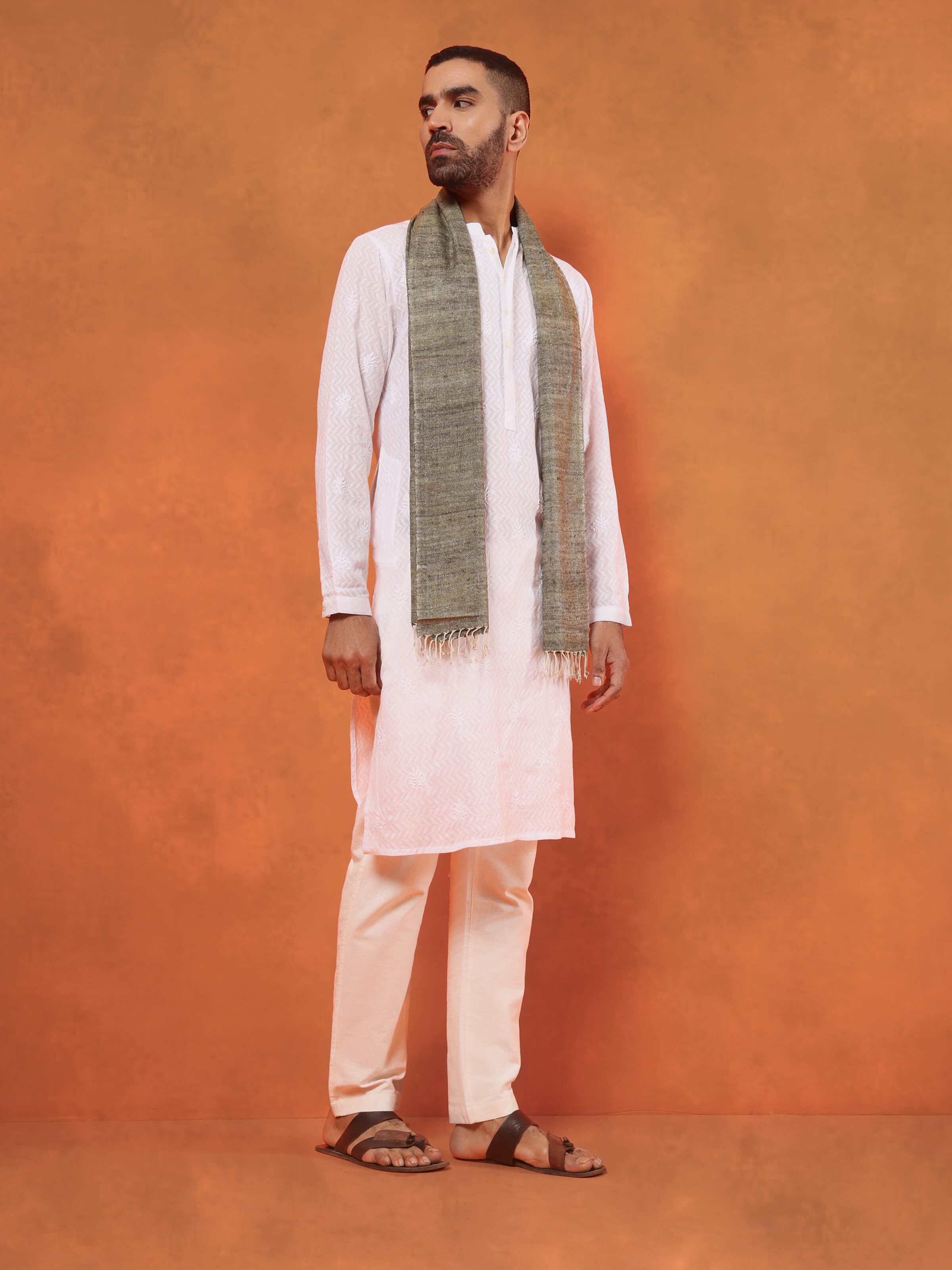 Lifestyle view of green Eri silk stole paired with ethnic outfit for an elegant look